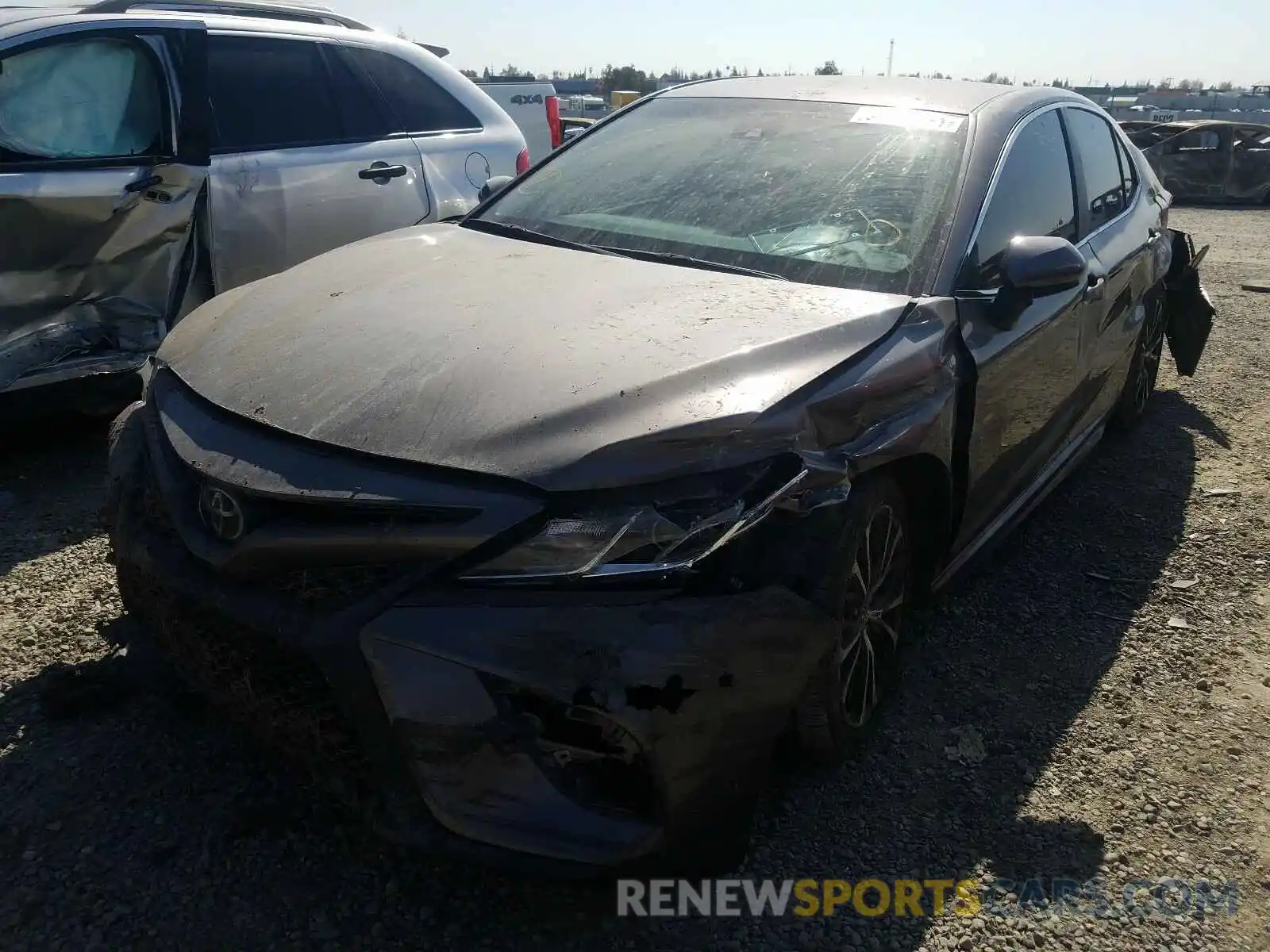 2 Photograph of a damaged car 4T1B11HK6KU693357 TOYOTA CAMRY 2019