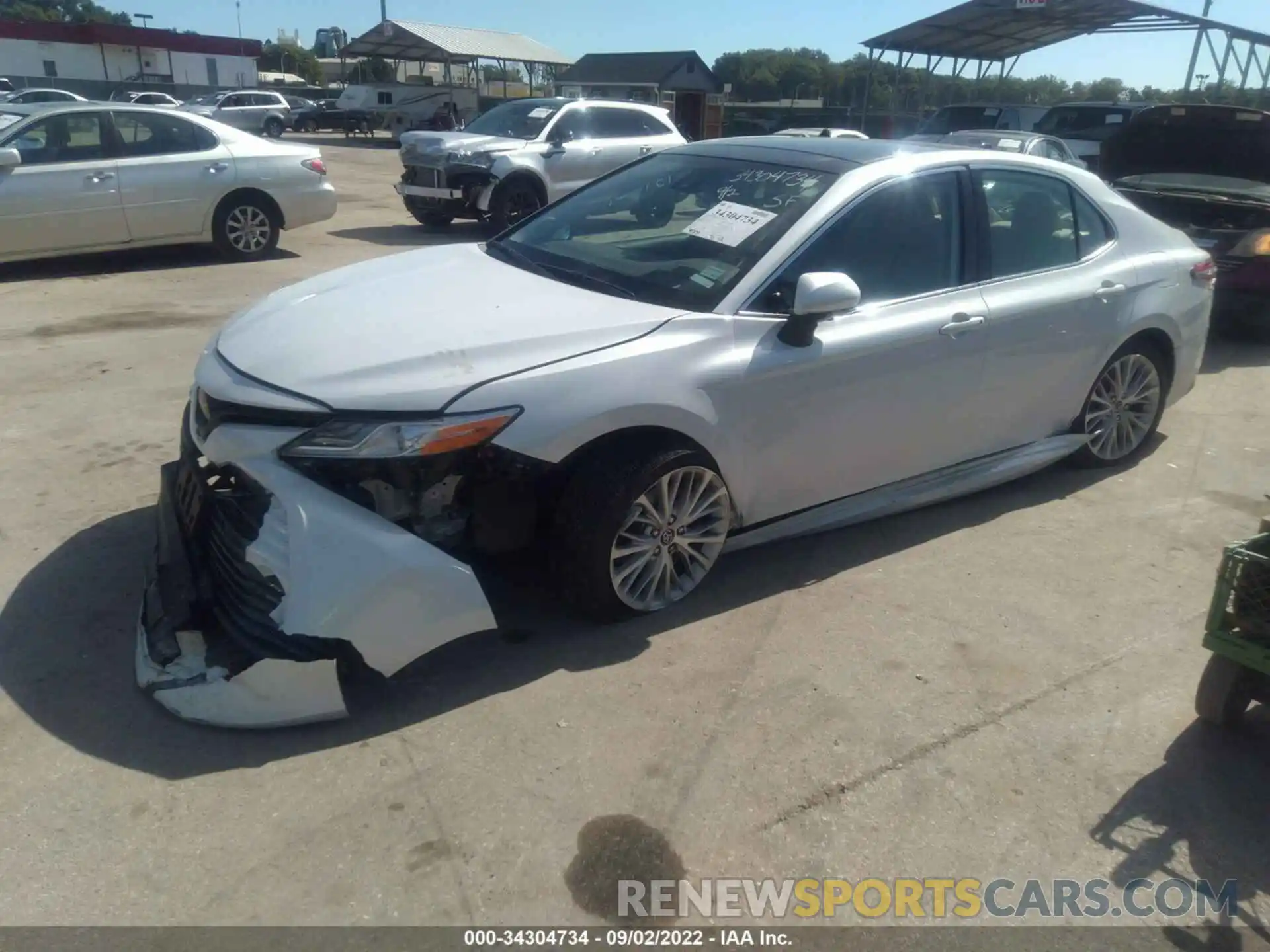 2 Photograph of a damaged car 4T1B11HK6KU693908 TOYOTA CAMRY 2019