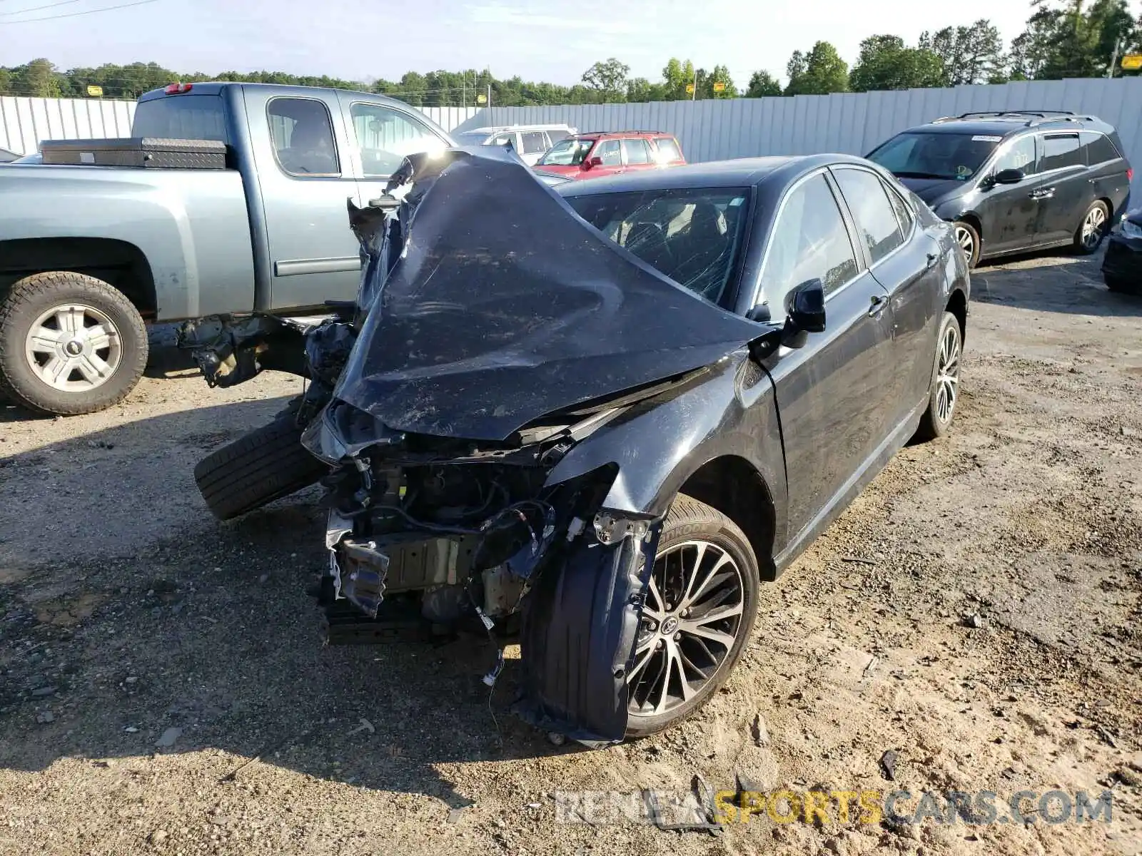 2 Photograph of a damaged car 4T1B11HK6KU694721 TOYOTA CAMRY 2019