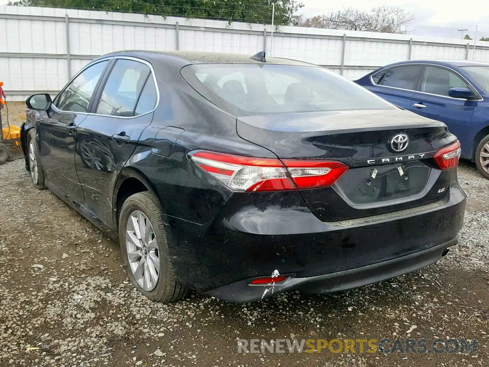 3 Photograph of a damaged car 4T1B11HK6KU702140 TOYOTA CAMRY 2019