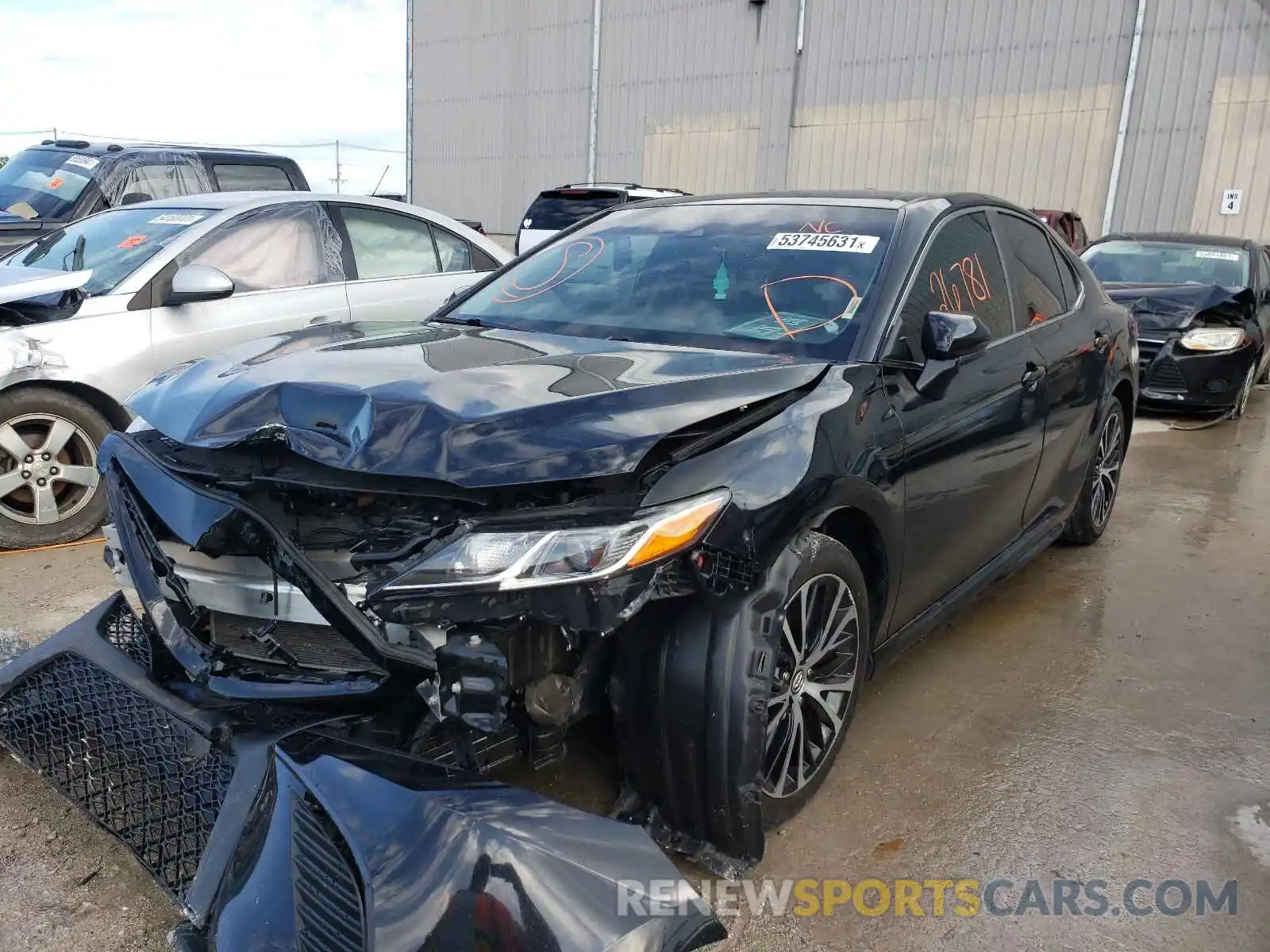 2 Photograph of a damaged car 4T1B11HK6KU705622 TOYOTA CAMRY 2019