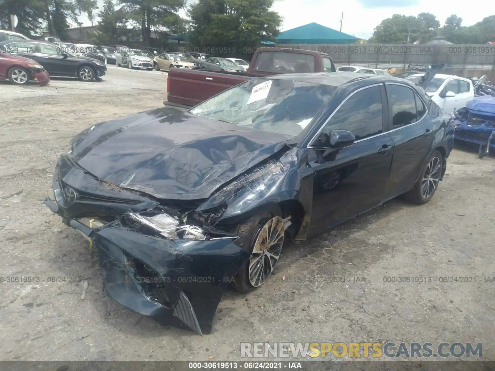 2 Photograph of a damaged car 4T1B11HK6KU710660 TOYOTA CAMRY 2019