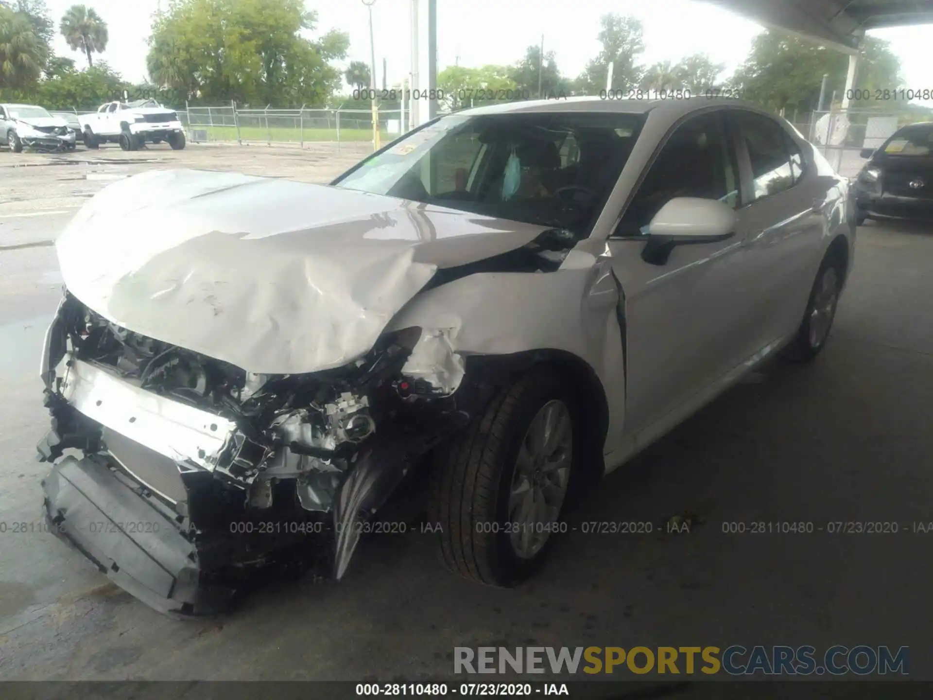 2 Photograph of a damaged car 4T1B11HK6KU712201 TOYOTA CAMRY 2019