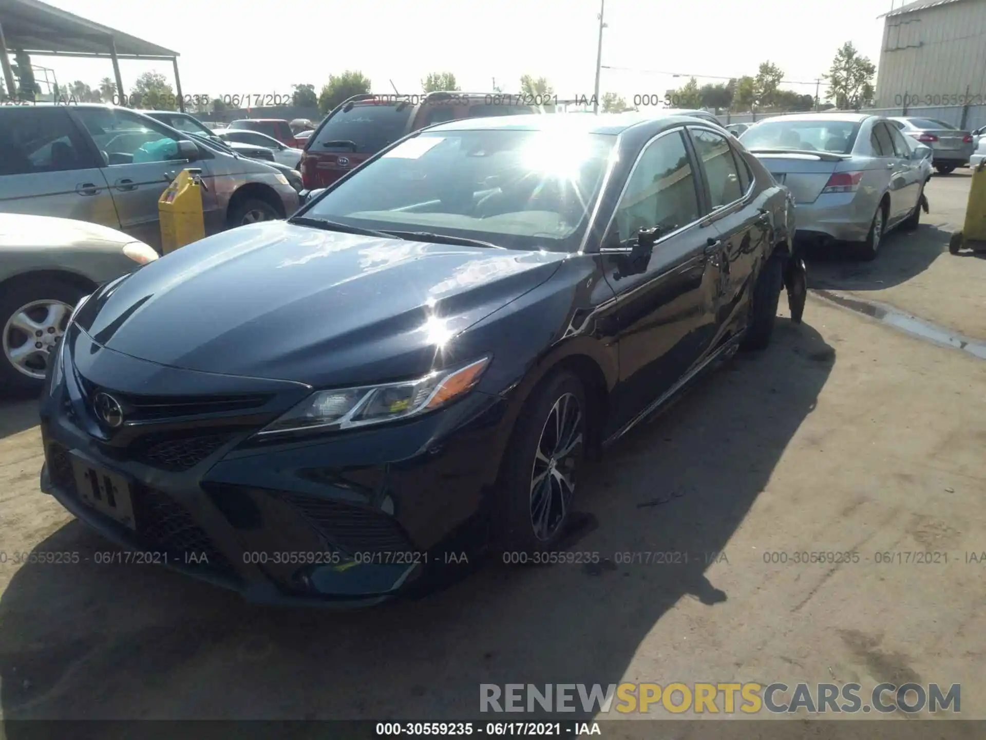 2 Photograph of a damaged car 4T1B11HK6KU712330 TOYOTA CAMRY 2019