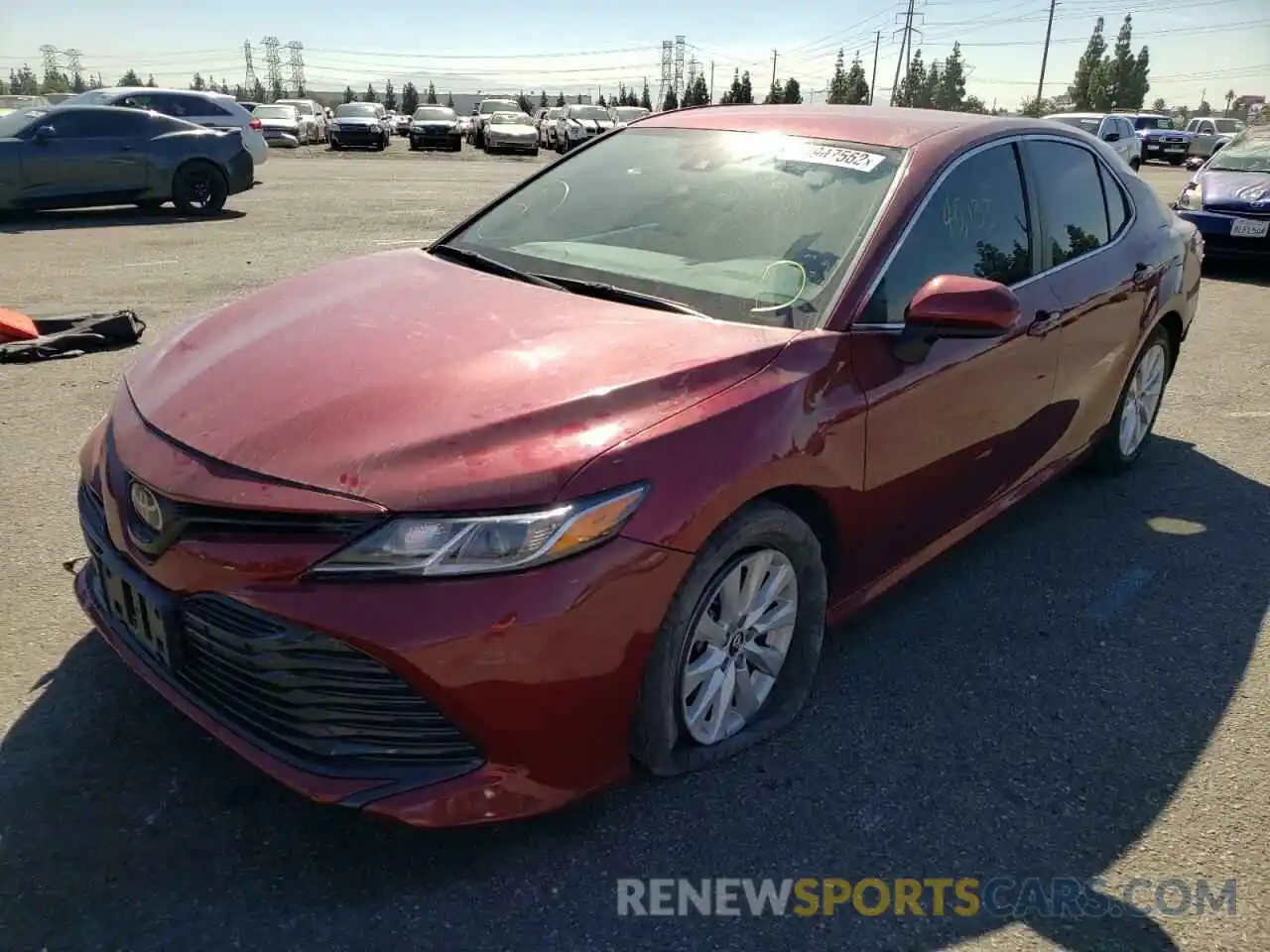 2 Photograph of a damaged car 4T1B11HK6KU730679 TOYOTA CAMRY 2019