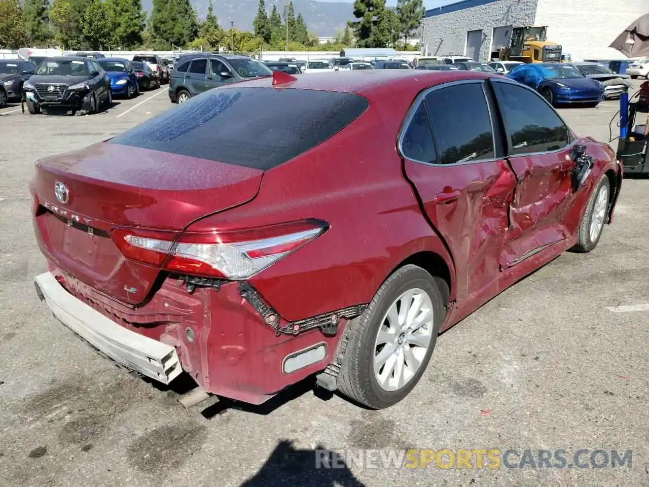 4 Photograph of a damaged car 4T1B11HK6KU730679 TOYOTA CAMRY 2019