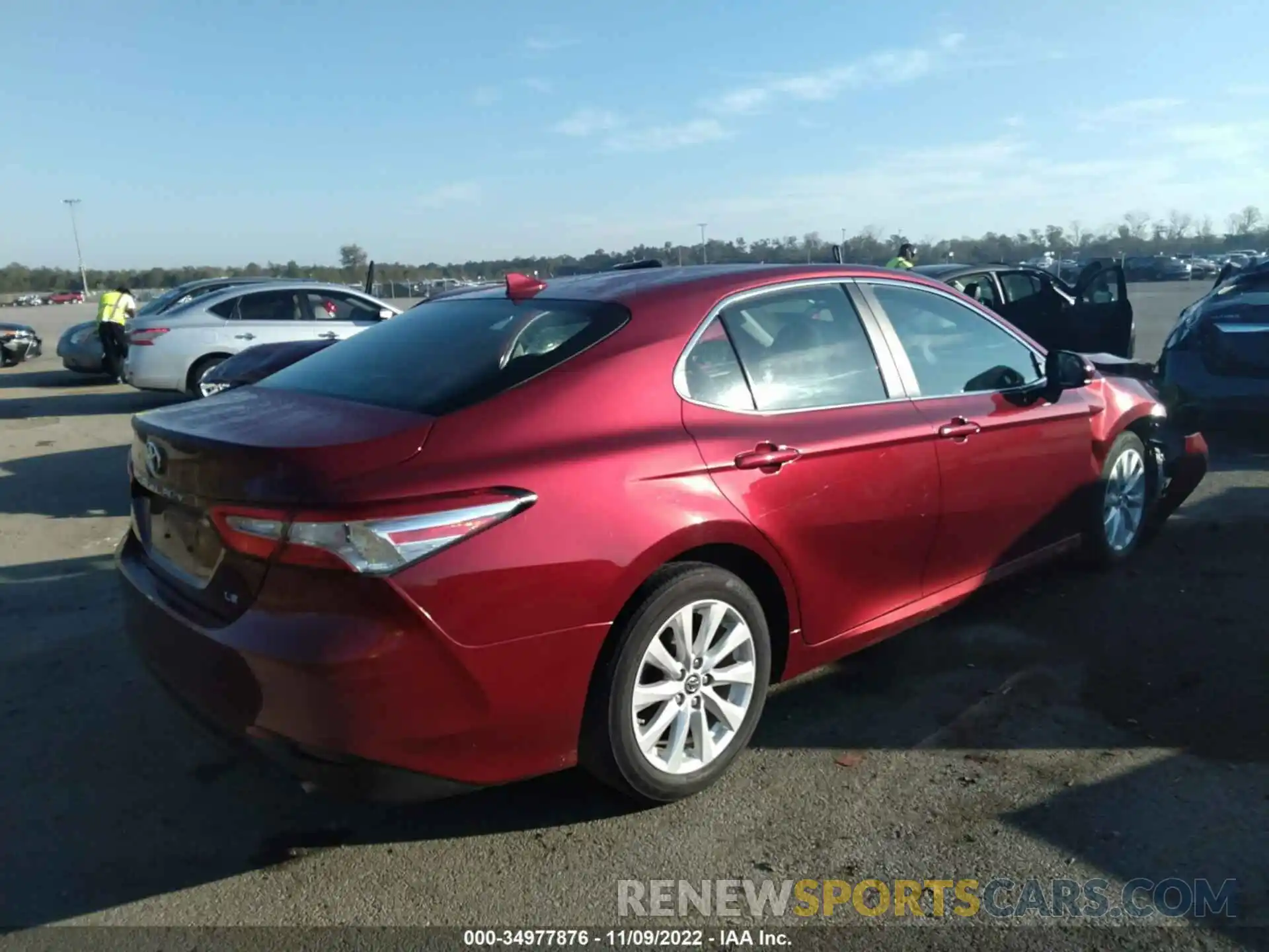 4 Photograph of a damaged car 4T1B11HK6KU734053 TOYOTA CAMRY 2019