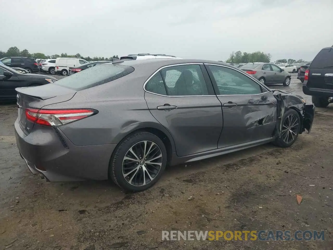 3 Photograph of a damaged car 4T1B11HK6KU740502 TOYOTA CAMRY 2019
