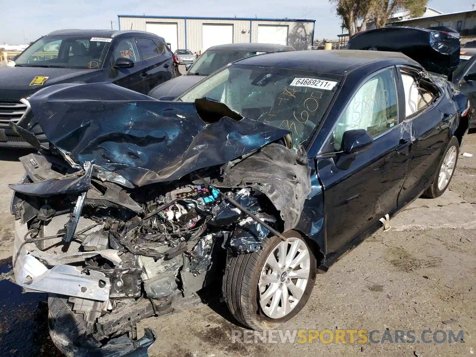 2 Photograph of a damaged car 4T1B11HK6KU741133 TOYOTA CAMRY 2019