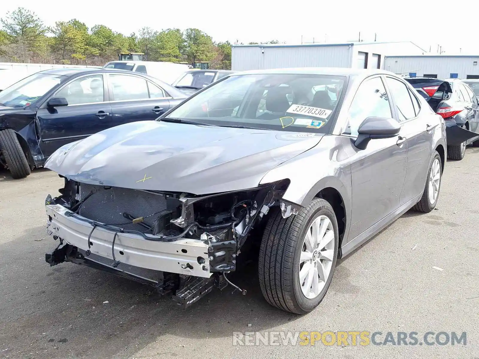 2 Photograph of a damaged car 4T1B11HK6KU748440 TOYOTA CAMRY 2019