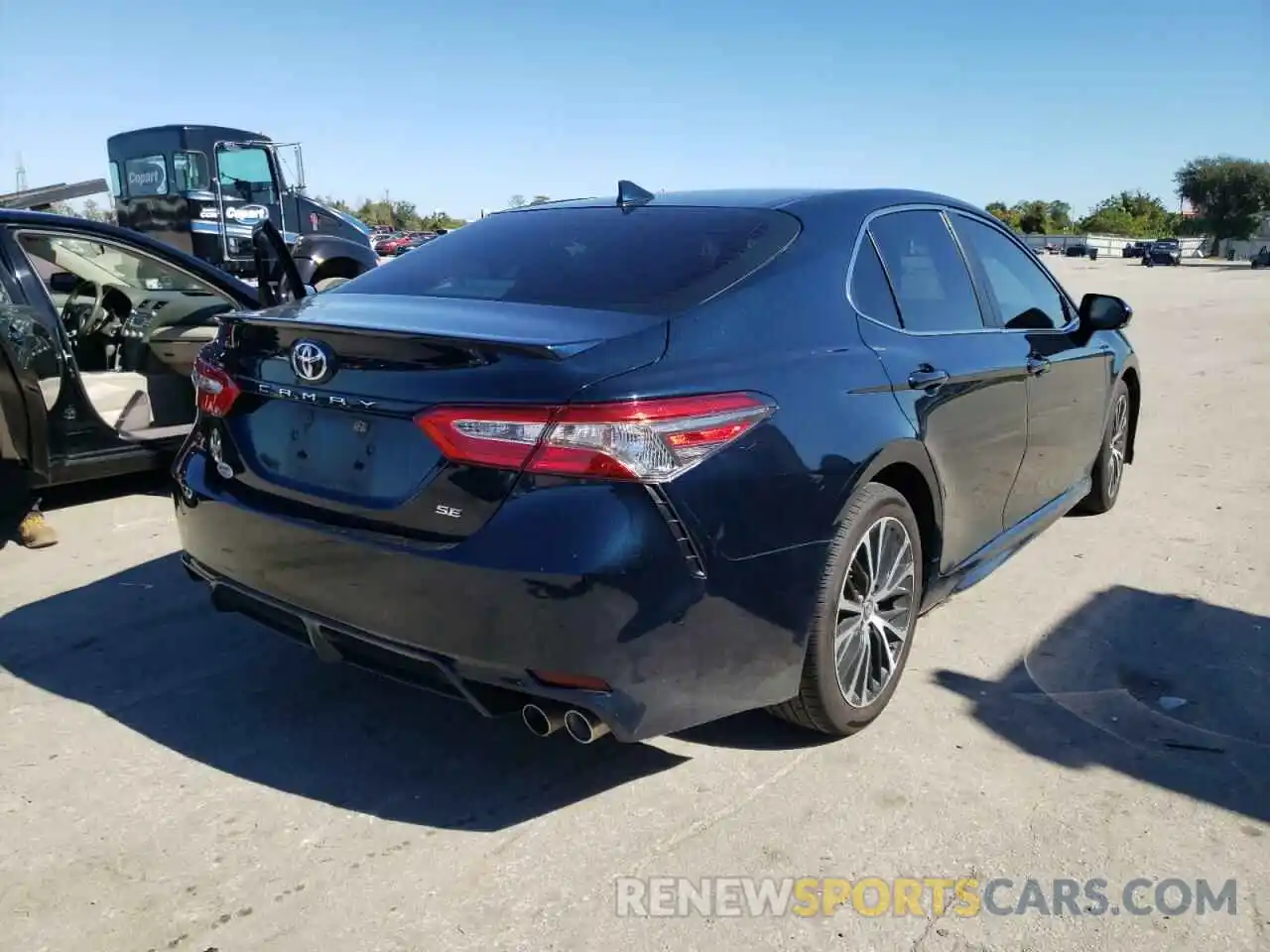 4 Photograph of a damaged car 4T1B11HK6KU753945 TOYOTA CAMRY 2019