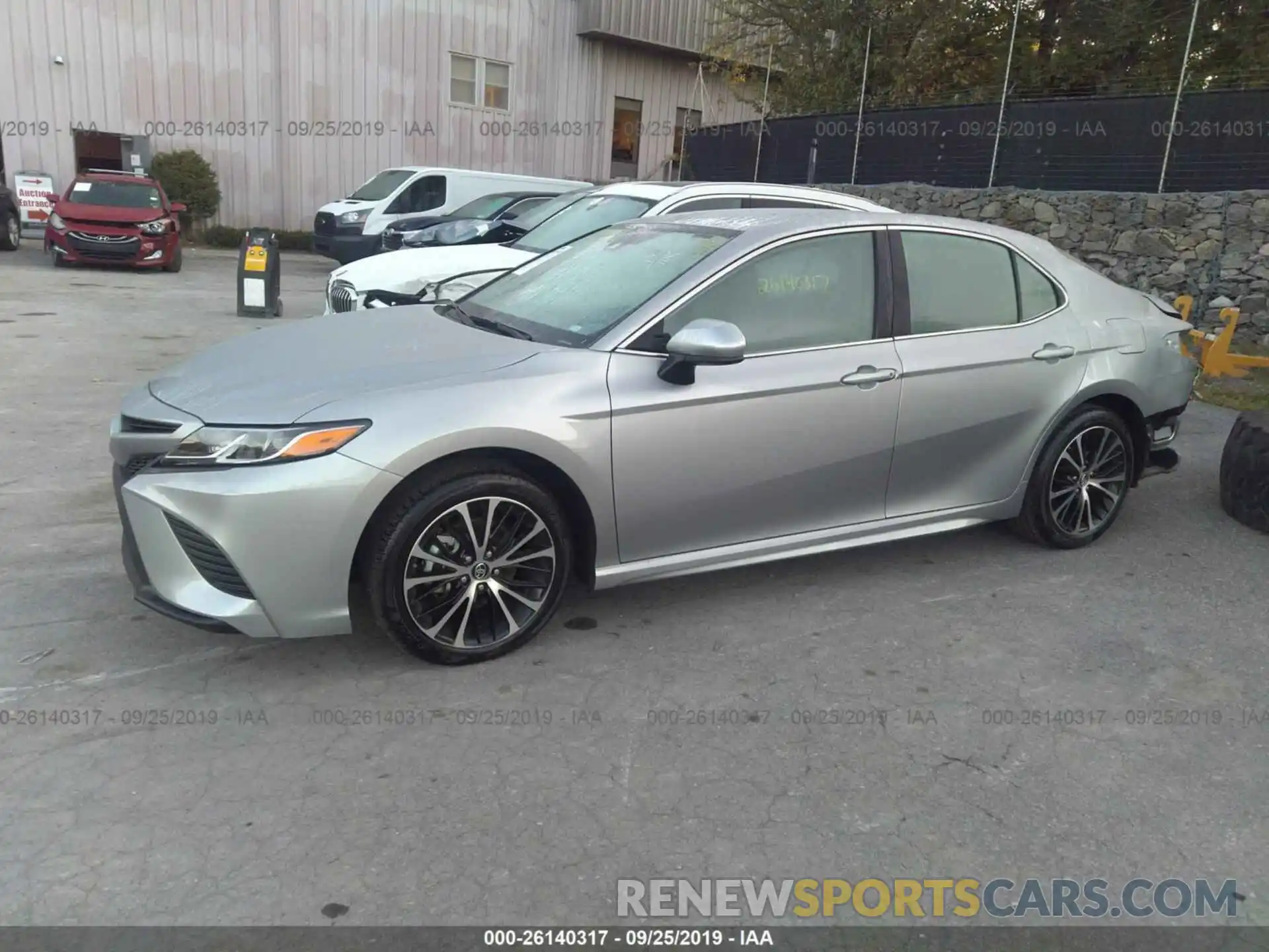 2 Photograph of a damaged car 4T1B11HK6KU758675 TOYOTA CAMRY 2019