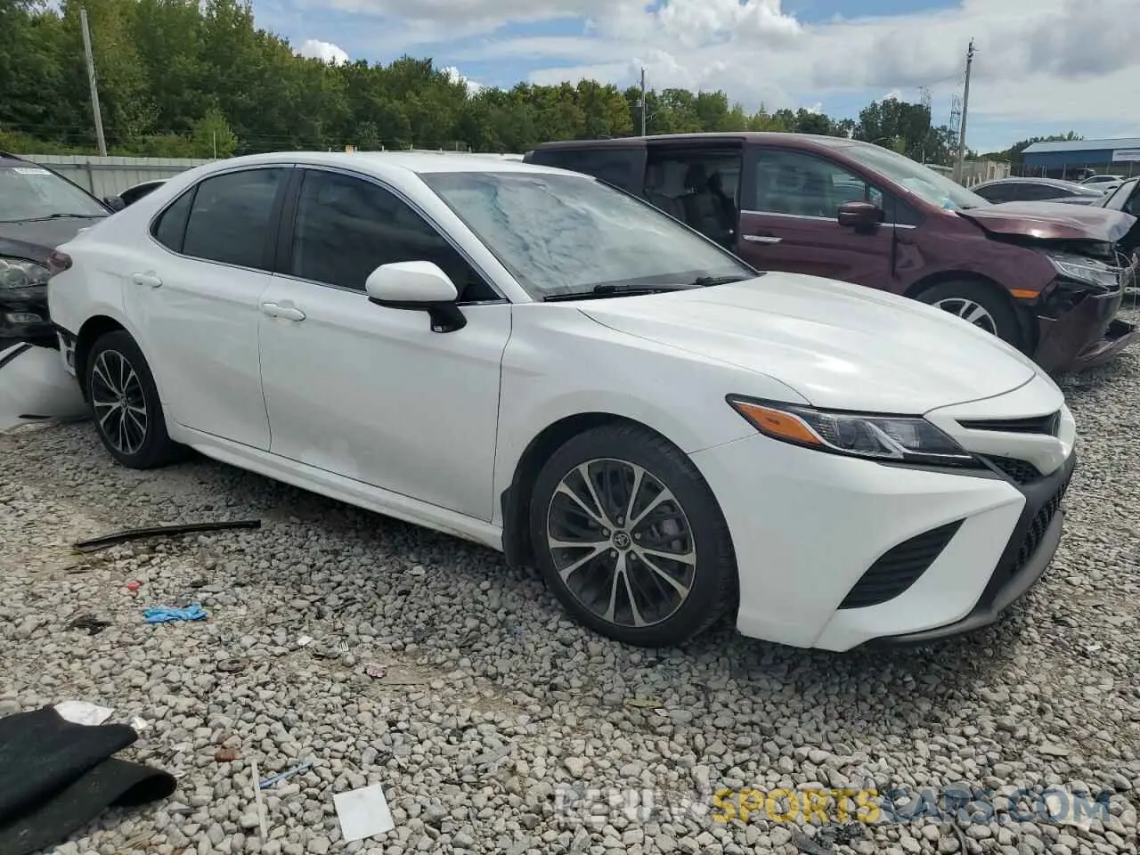4 Photograph of a damaged car 4T1B11HK6KU765450 TOYOTA CAMRY 2019