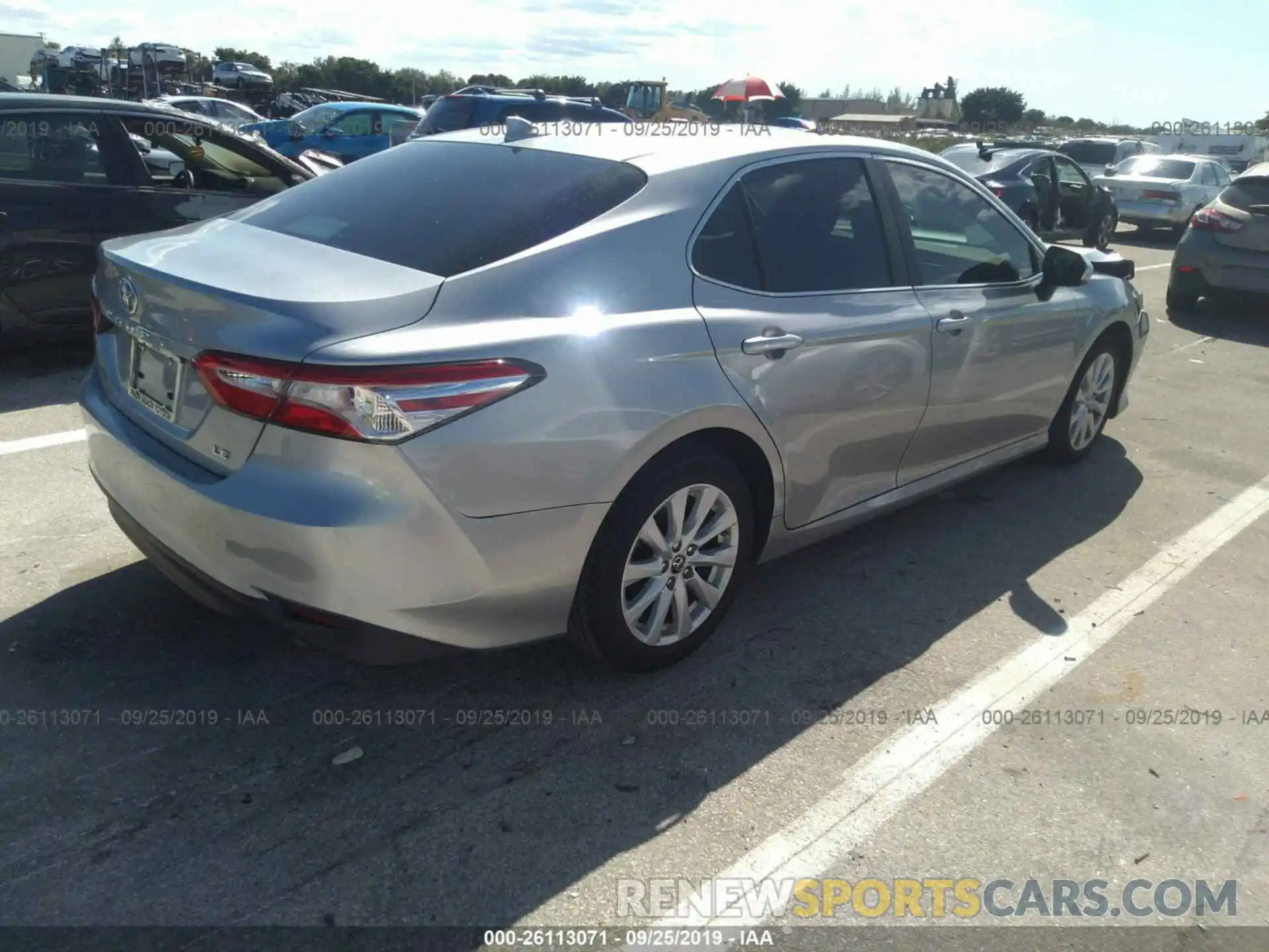 4 Photograph of a damaged car 4T1B11HK6KU766307 TOYOTA CAMRY 2019