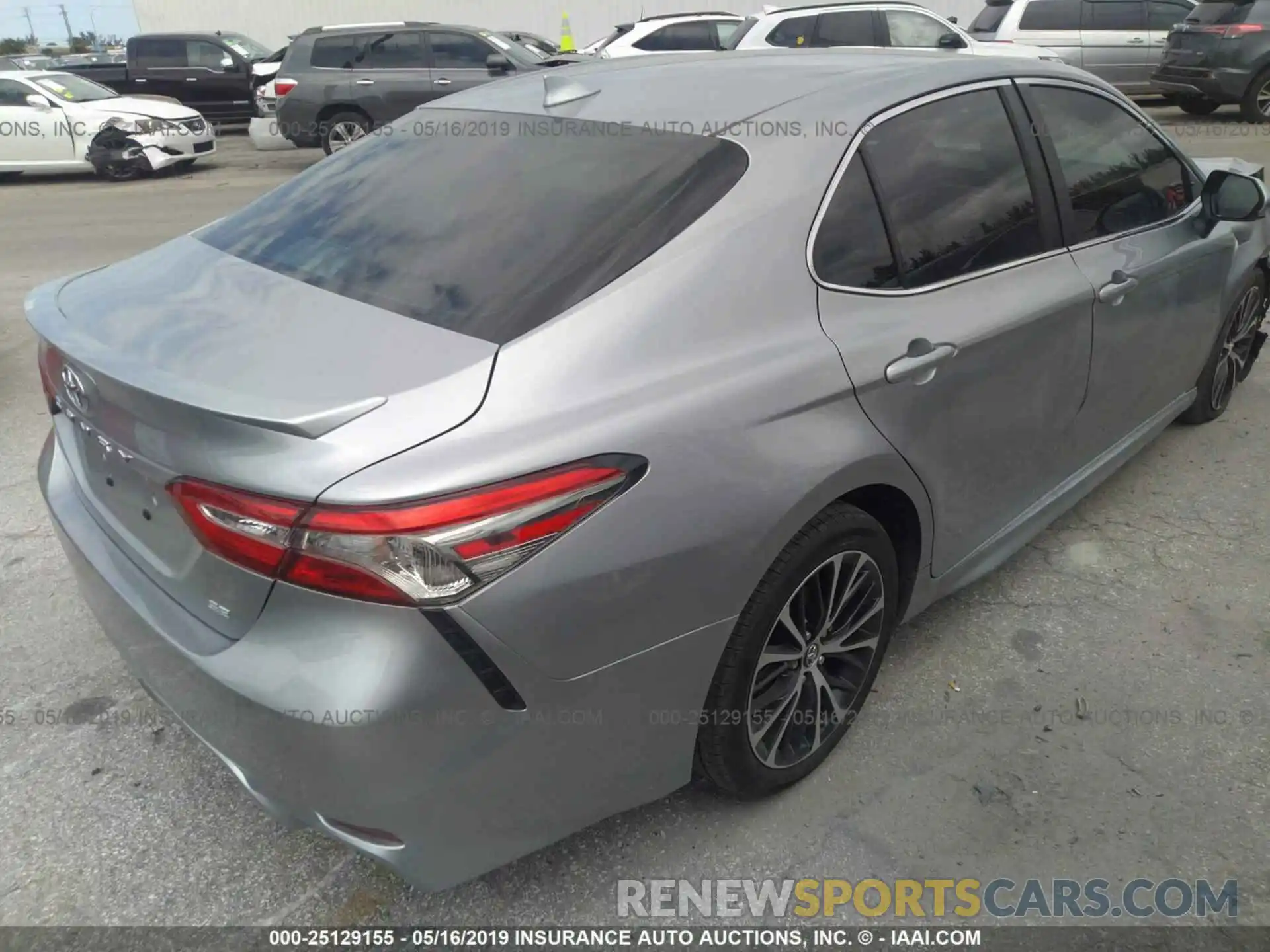 4 Photograph of a damaged car 4T1B11HK6KU766775 TOYOTA CAMRY 2019