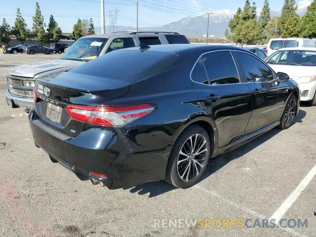 3 Photograph of a damaged car 4T1B11HK6KU772866 TOYOTA CAMRY 2019