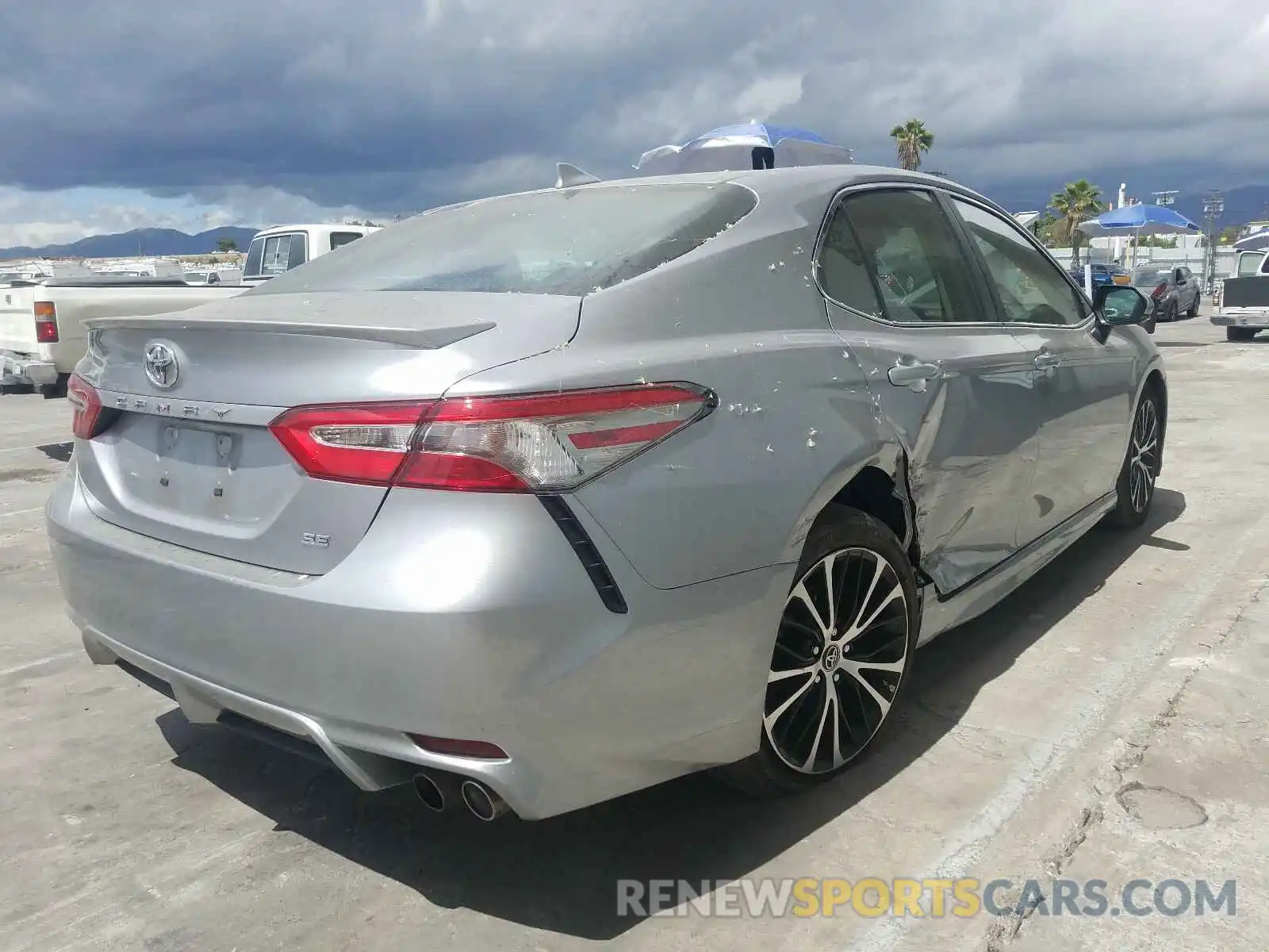 4 Photograph of a damaged car 4T1B11HK6KU773127 TOYOTA CAMRY 2019