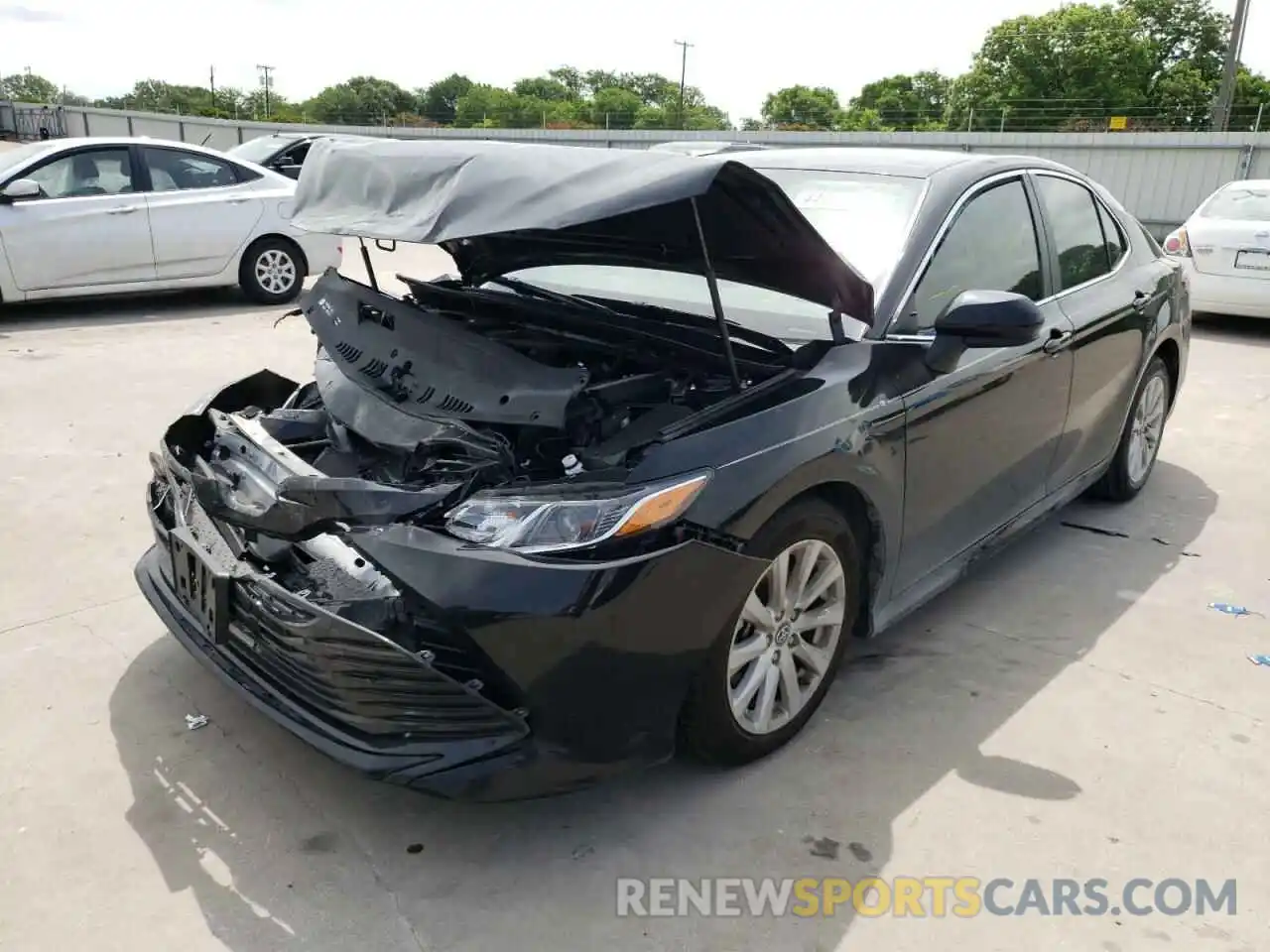 2 Photograph of a damaged car 4T1B11HK6KU777422 TOYOTA CAMRY 2019