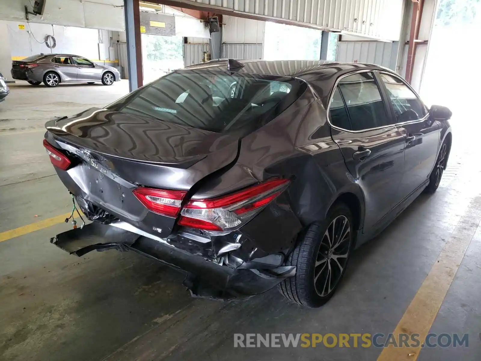 4 Photograph of a damaged car 4T1B11HK6KU784239 TOYOTA CAMRY 2019