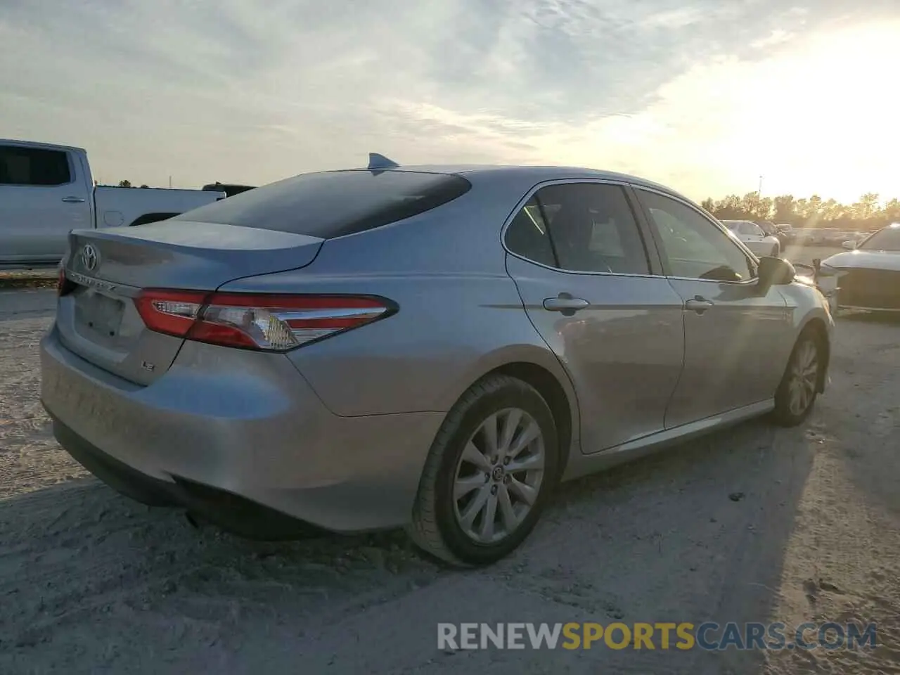3 Photograph of a damaged car 4T1B11HK6KU784872 TOYOTA CAMRY 2019