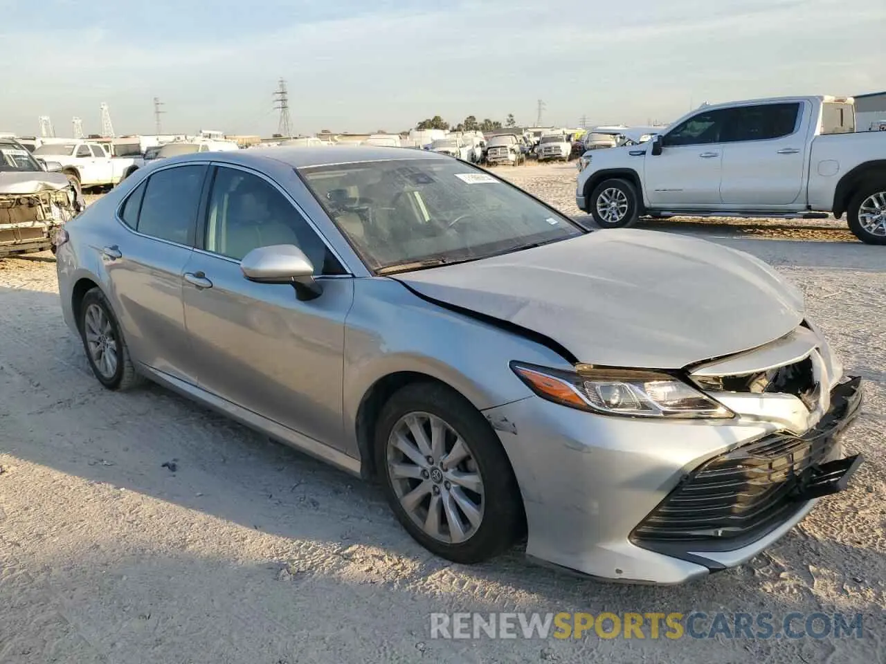 4 Photograph of a damaged car 4T1B11HK6KU784872 TOYOTA CAMRY 2019