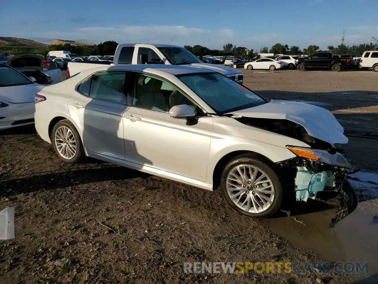 4 Photograph of a damaged car 4T1B11HK6KU790378 TOYOTA CAMRY 2019