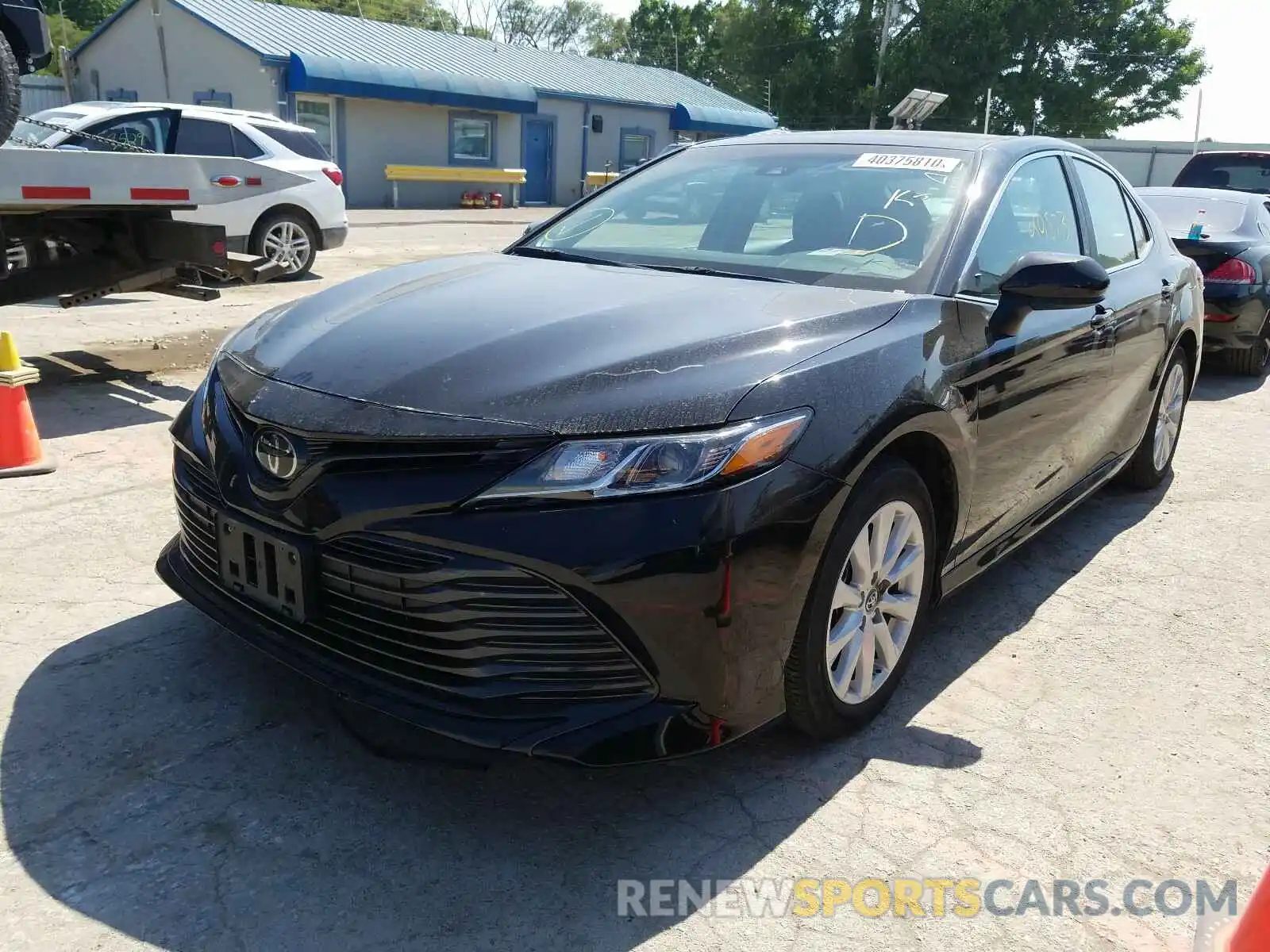 2 Photograph of a damaged car 4T1B11HK6KU803551 TOYOTA CAMRY 2019