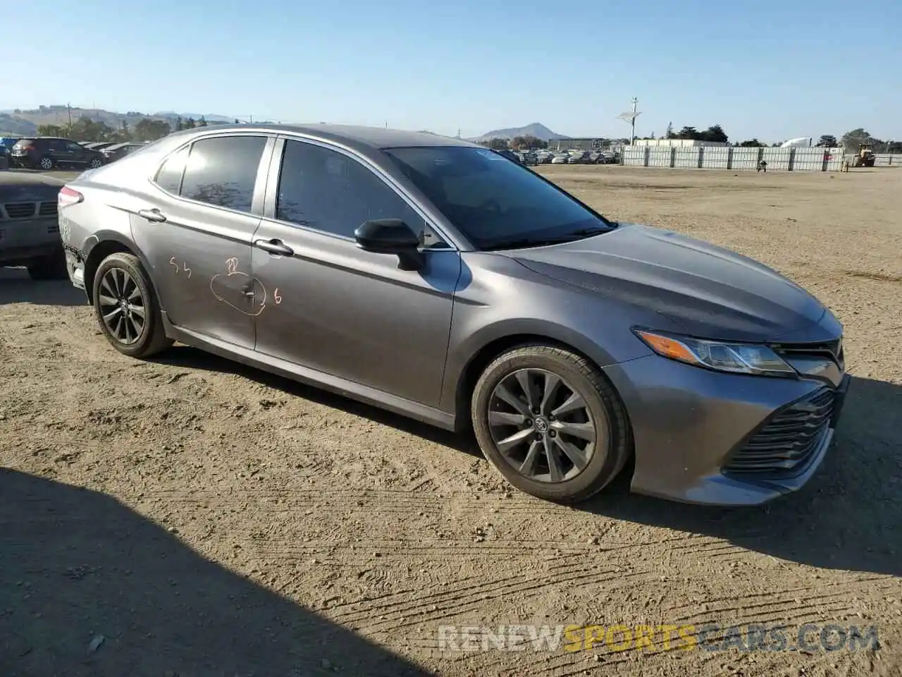 4 Photograph of a damaged car 4T1B11HK6KU804179 TOYOTA CAMRY 2019