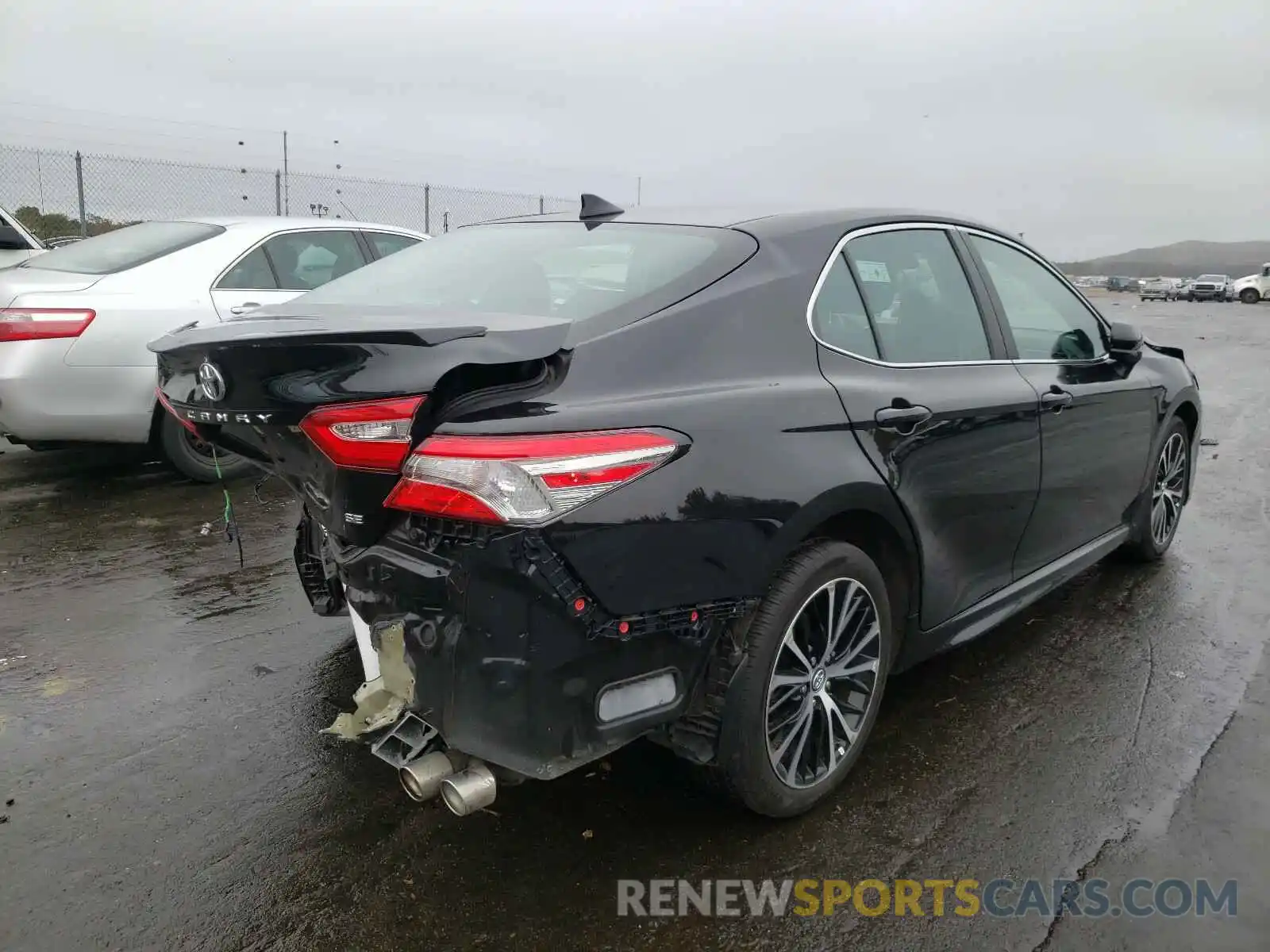 4 Photograph of a damaged car 4T1B11HK6KU804523 TOYOTA CAMRY 2019