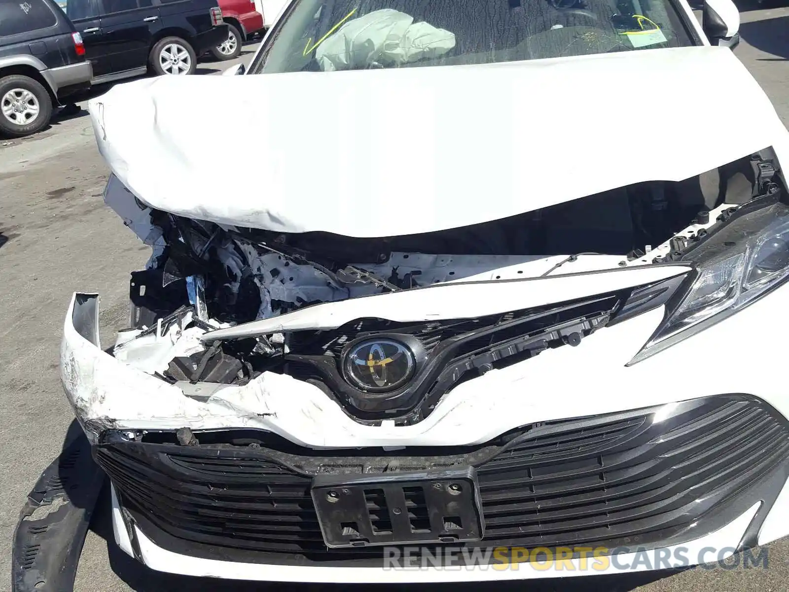 9 Photograph of a damaged car 4T1B11HK6KU805090 TOYOTA CAMRY 2019