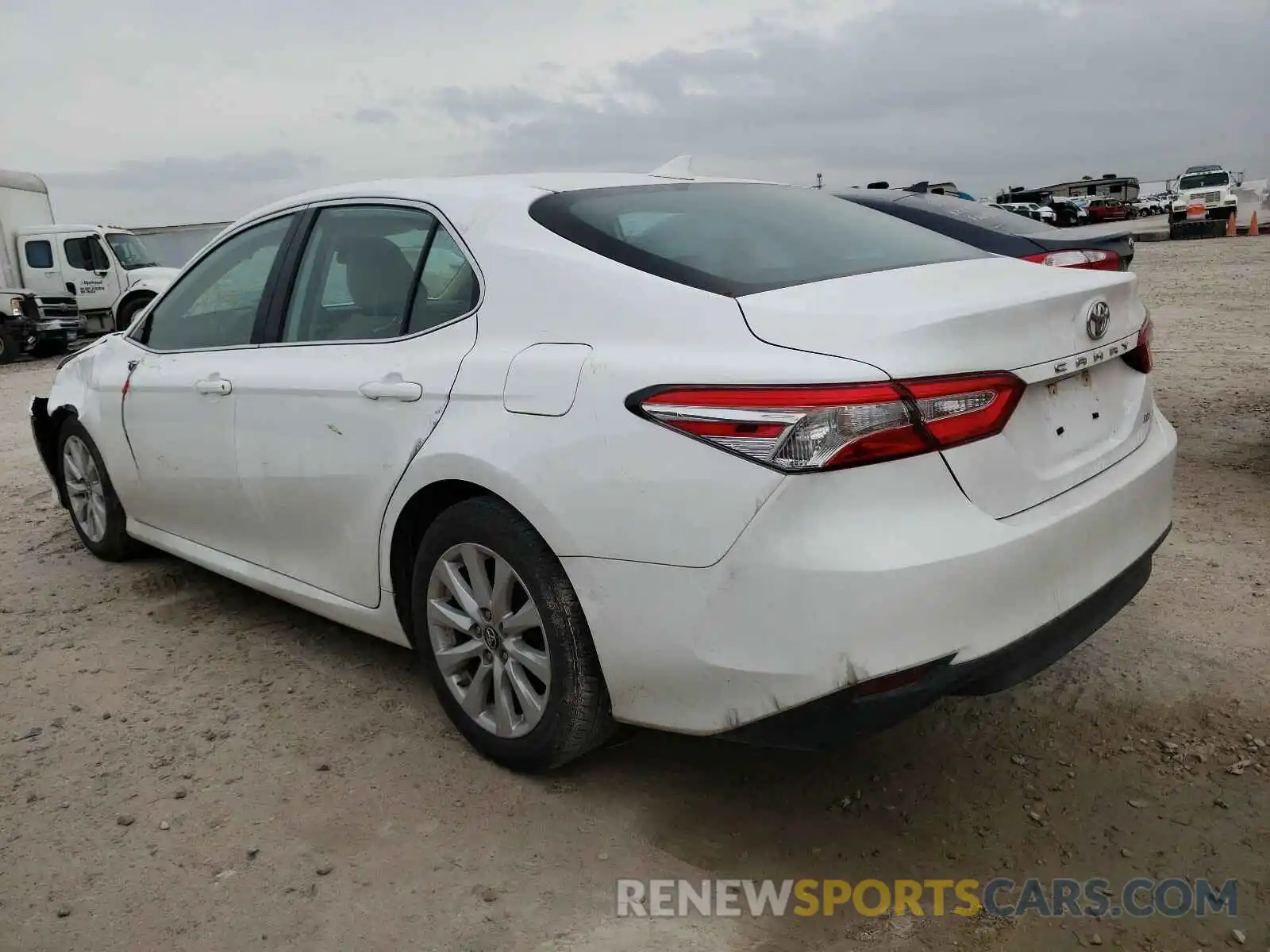 3 Photograph of a damaged car 4T1B11HK6KU807521 TOYOTA CAMRY 2019