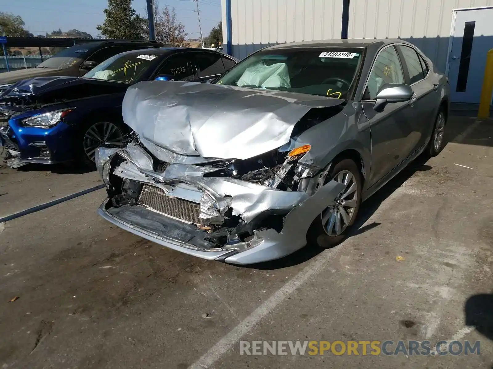 2 Photograph of a damaged car 4T1B11HK6KU809298 TOYOTA CAMRY 2019