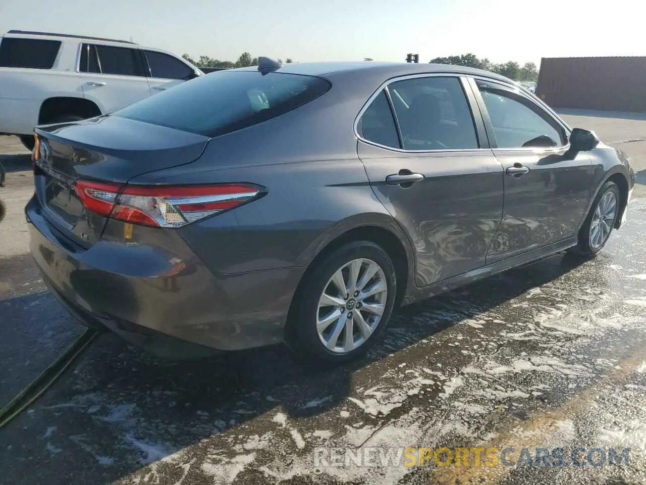 3 Photograph of a damaged car 4T1B11HK6KU813609 TOYOTA CAMRY 2019