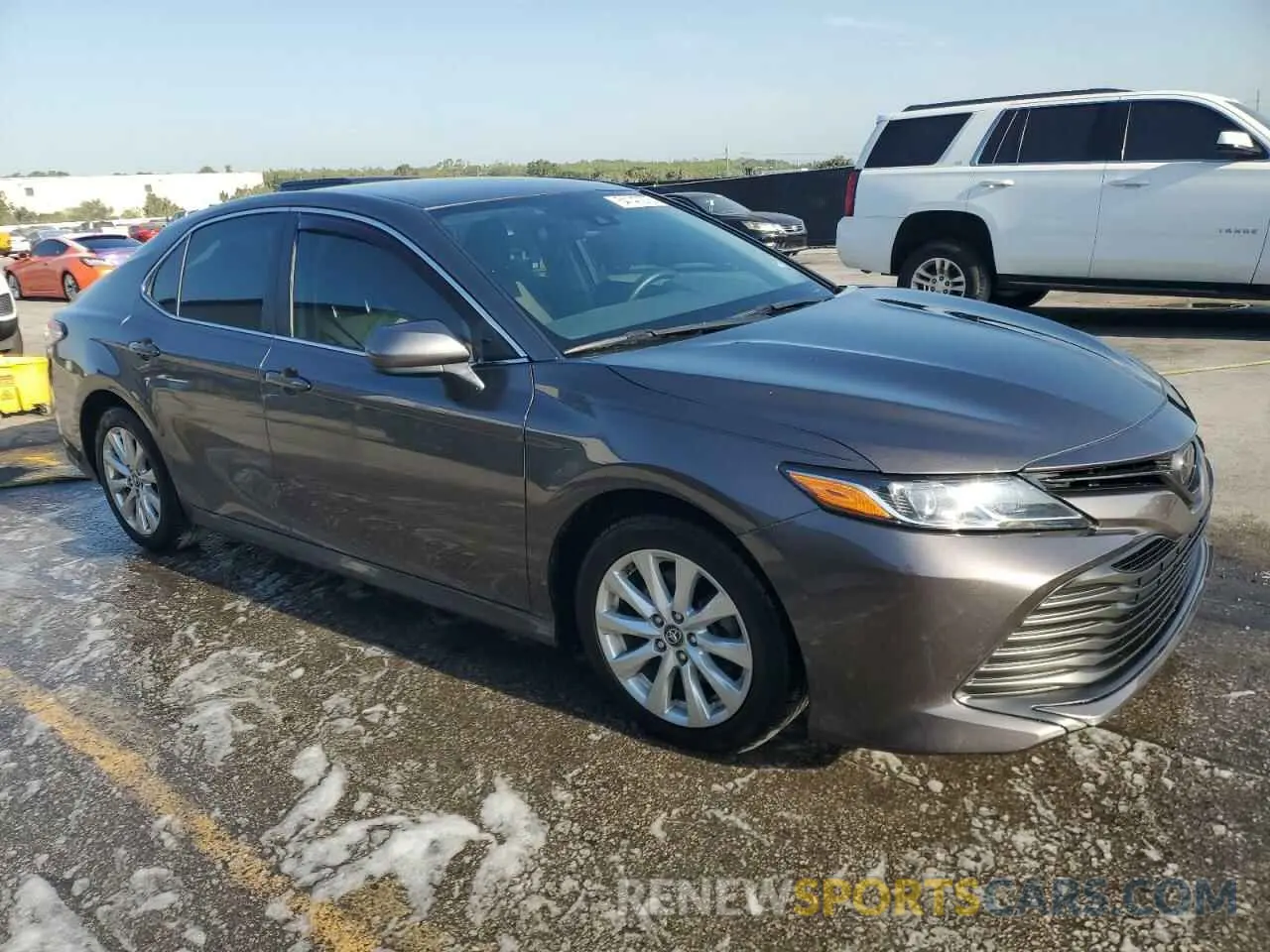 4 Photograph of a damaged car 4T1B11HK6KU813609 TOYOTA CAMRY 2019