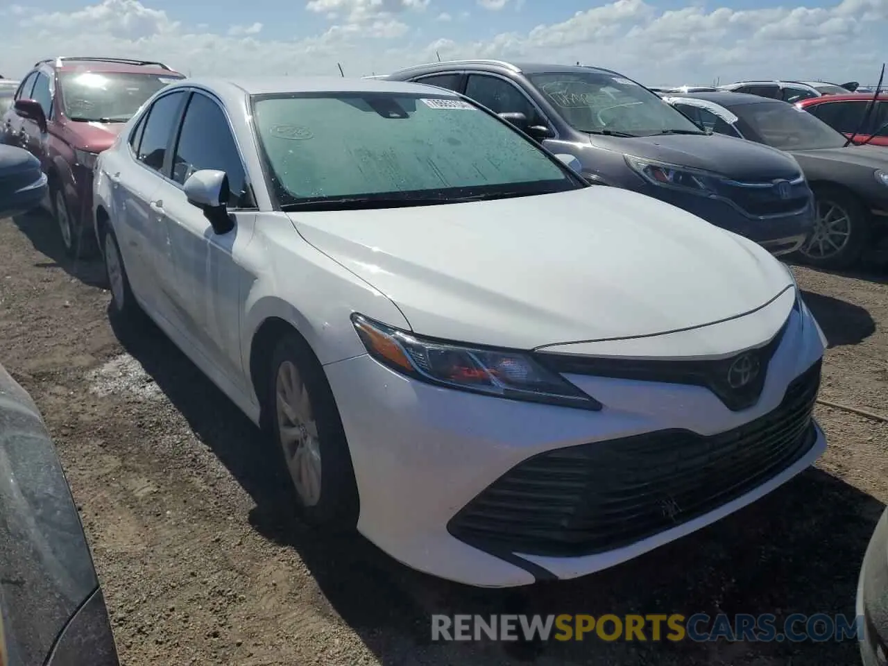 4 Photograph of a damaged car 4T1B11HK6KU844519 TOYOTA CAMRY 2019