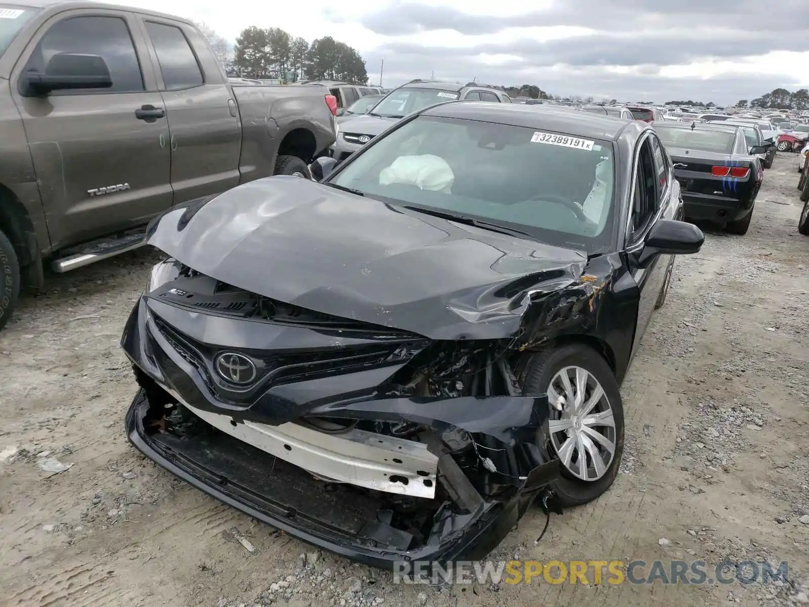 2 Photograph of a damaged car 4T1B11HK6KU855469 TOYOTA CAMRY 2019