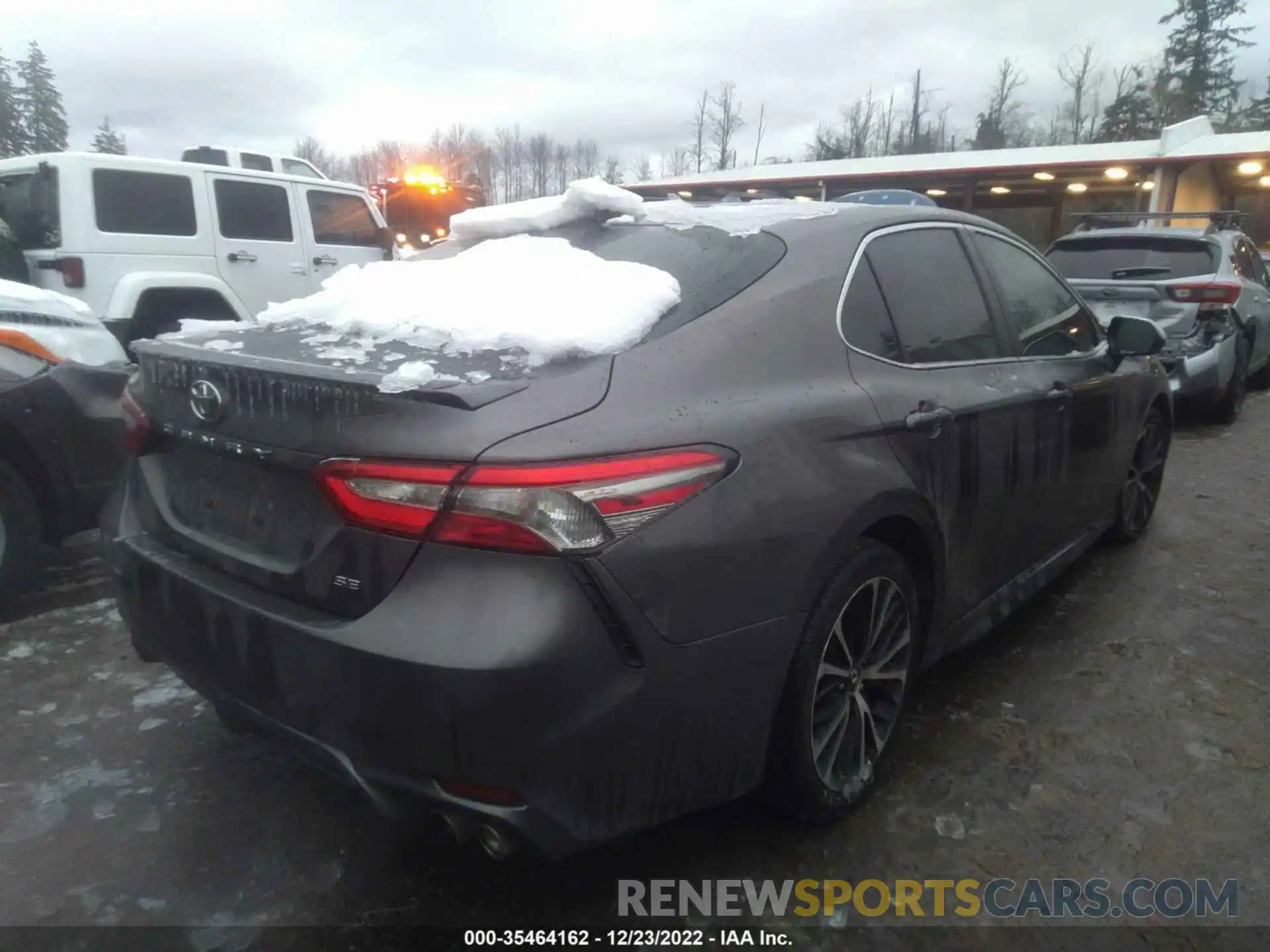 4 Photograph of a damaged car 4T1B11HK7KU163401 TOYOTA CAMRY 2019