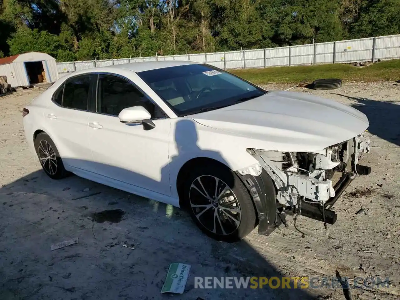 4 Photograph of a damaged car 4T1B11HK7KU194387 TOYOTA CAMRY 2019