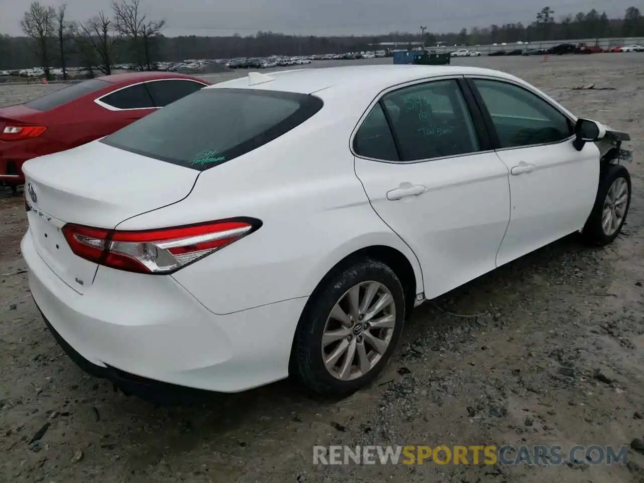 4 Photograph of a damaged car 4T1B11HK7KU194924 TOYOTA CAMRY 2019