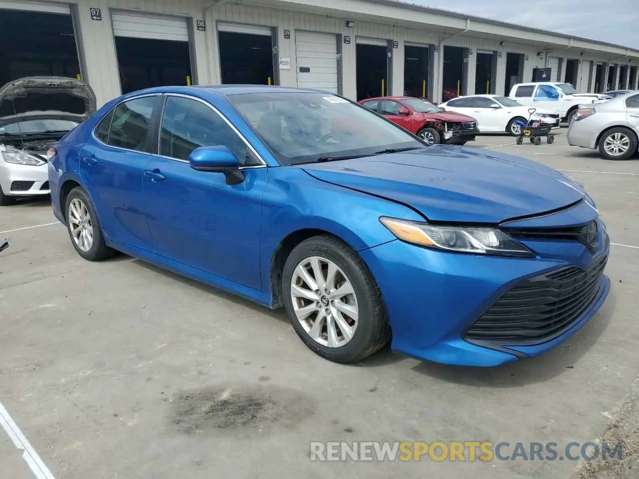 4 Photograph of a damaged car 4T1B11HK7KU195958 TOYOTA CAMRY 2019