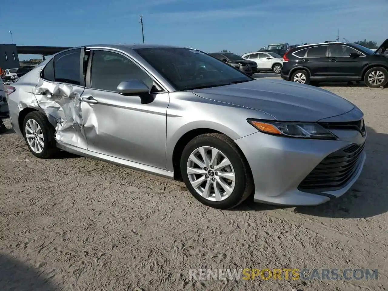 4 Photograph of a damaged car 4T1B11HK7KU200253 TOYOTA CAMRY 2019