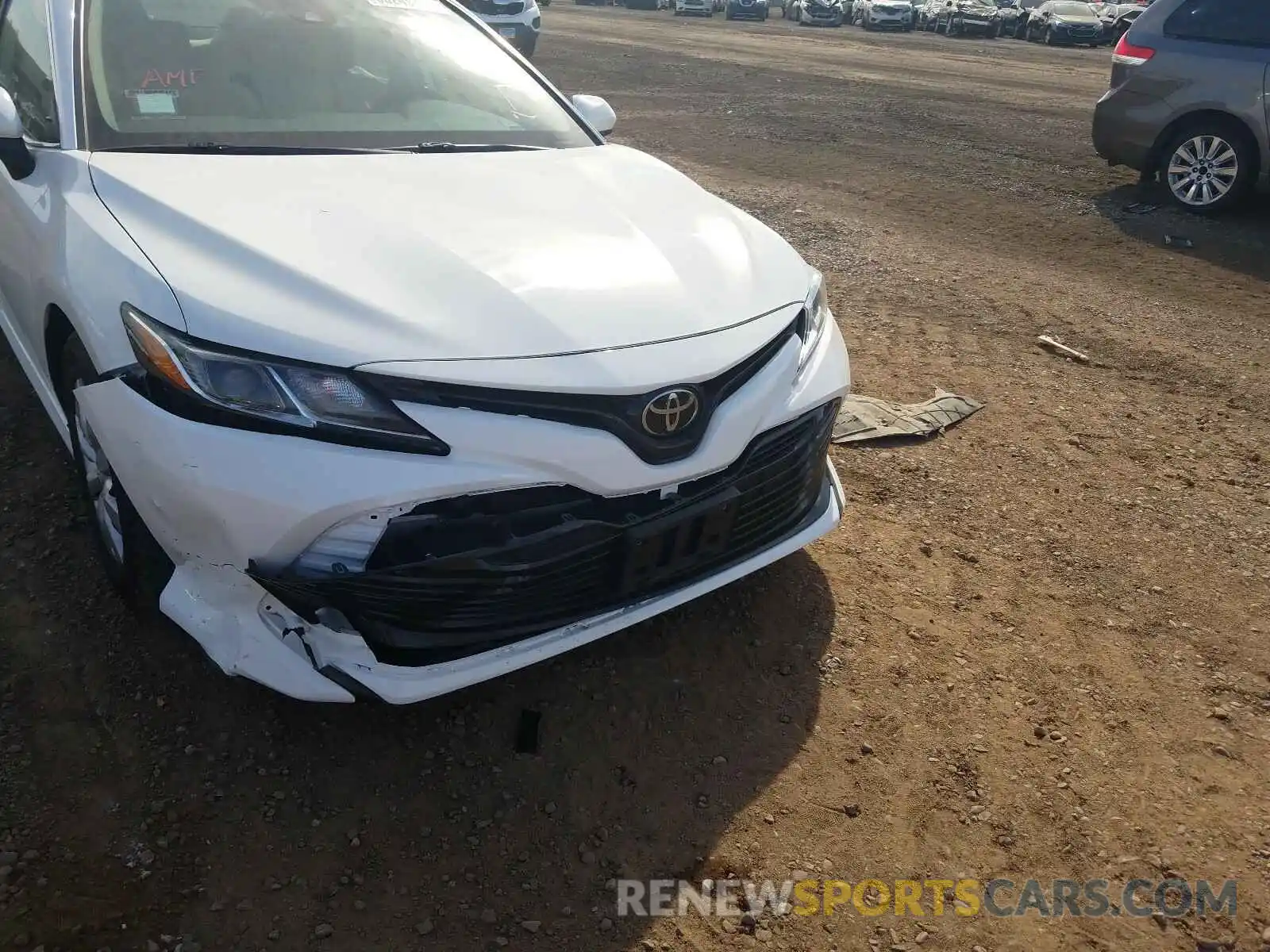 9 Photograph of a damaged car 4T1B11HK7KU204805 TOYOTA CAMRY 2019