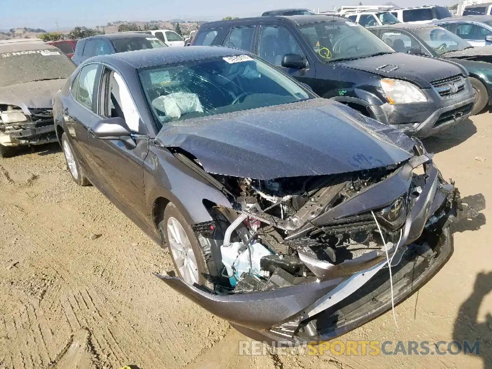 1 Photograph of a damaged car 4T1B11HK7KU212774 TOYOTA CAMRY 2019