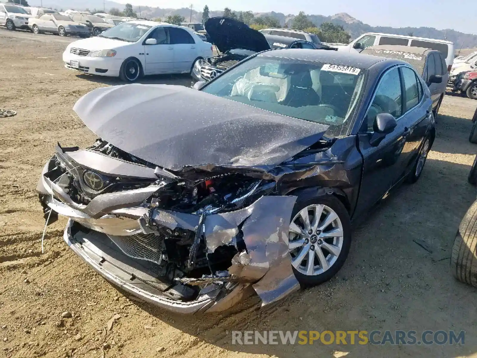 2 Photograph of a damaged car 4T1B11HK7KU212774 TOYOTA CAMRY 2019