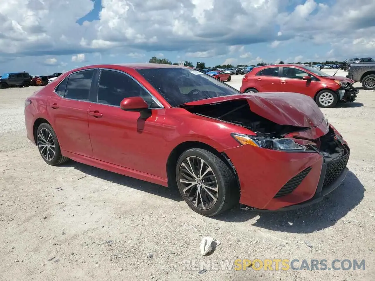 4 Photograph of a damaged car 4T1B11HK7KU228618 TOYOTA CAMRY 2019