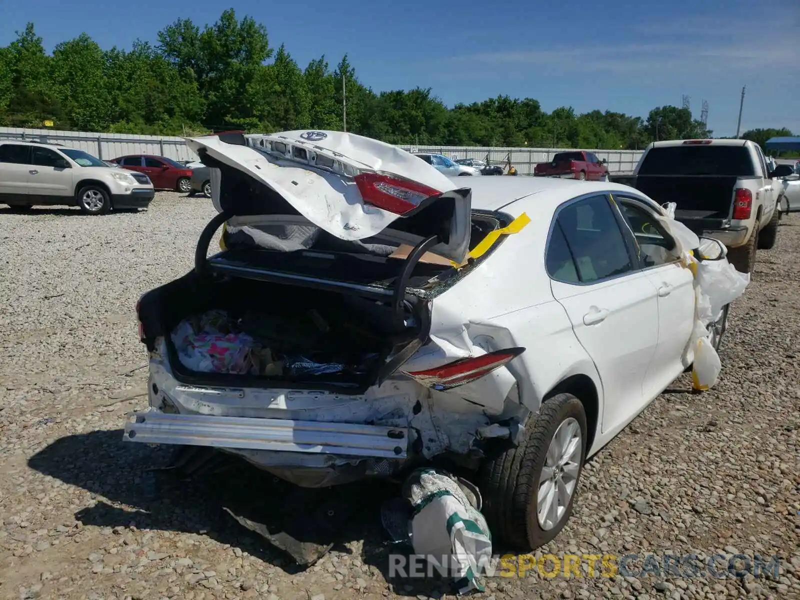 4 Photograph of a damaged car 4T1B11HK7KU232667 TOYOTA CAMRY 2019