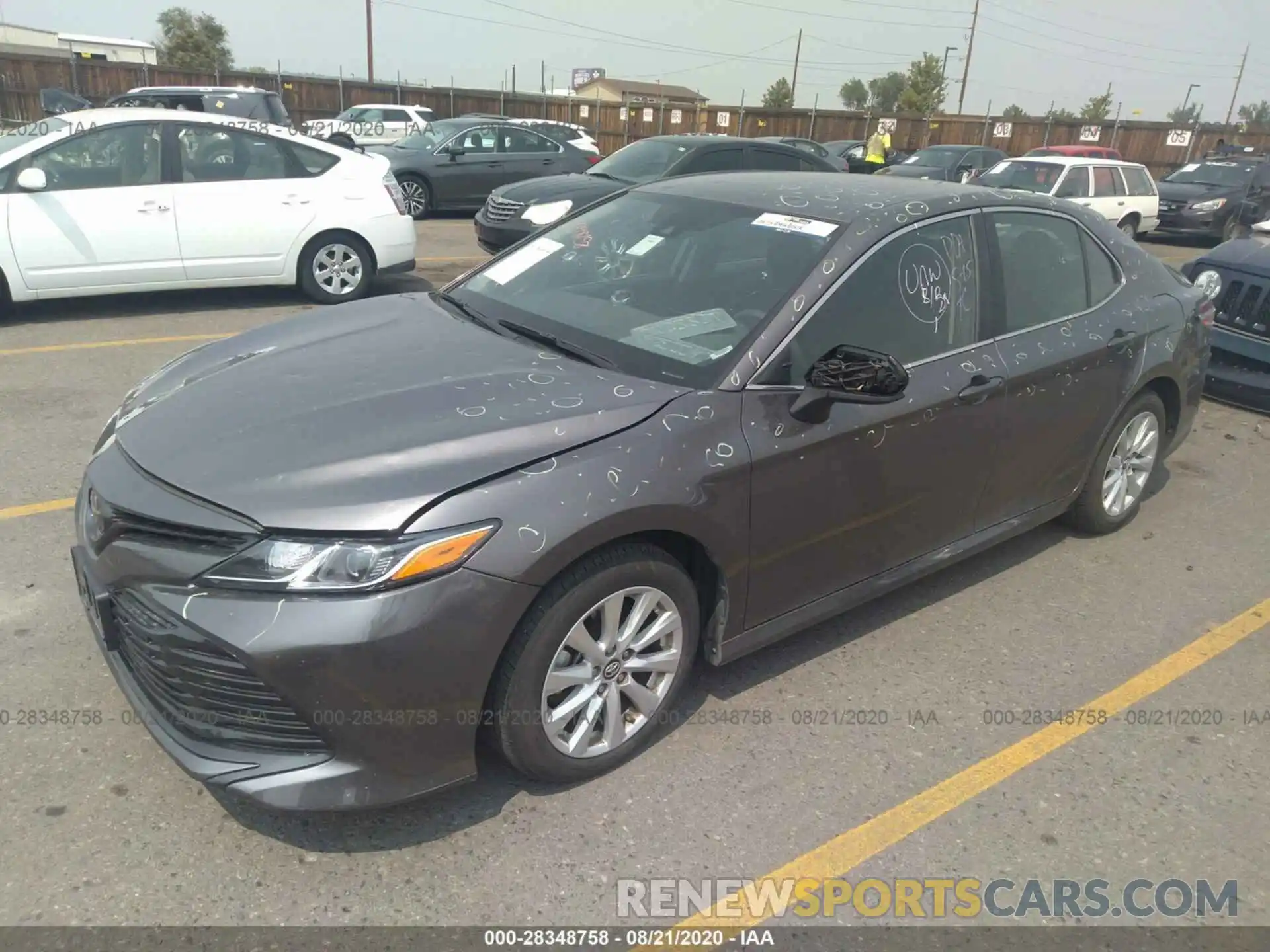 2 Photograph of a damaged car 4T1B11HK7KU243023 TOYOTA CAMRY 2019