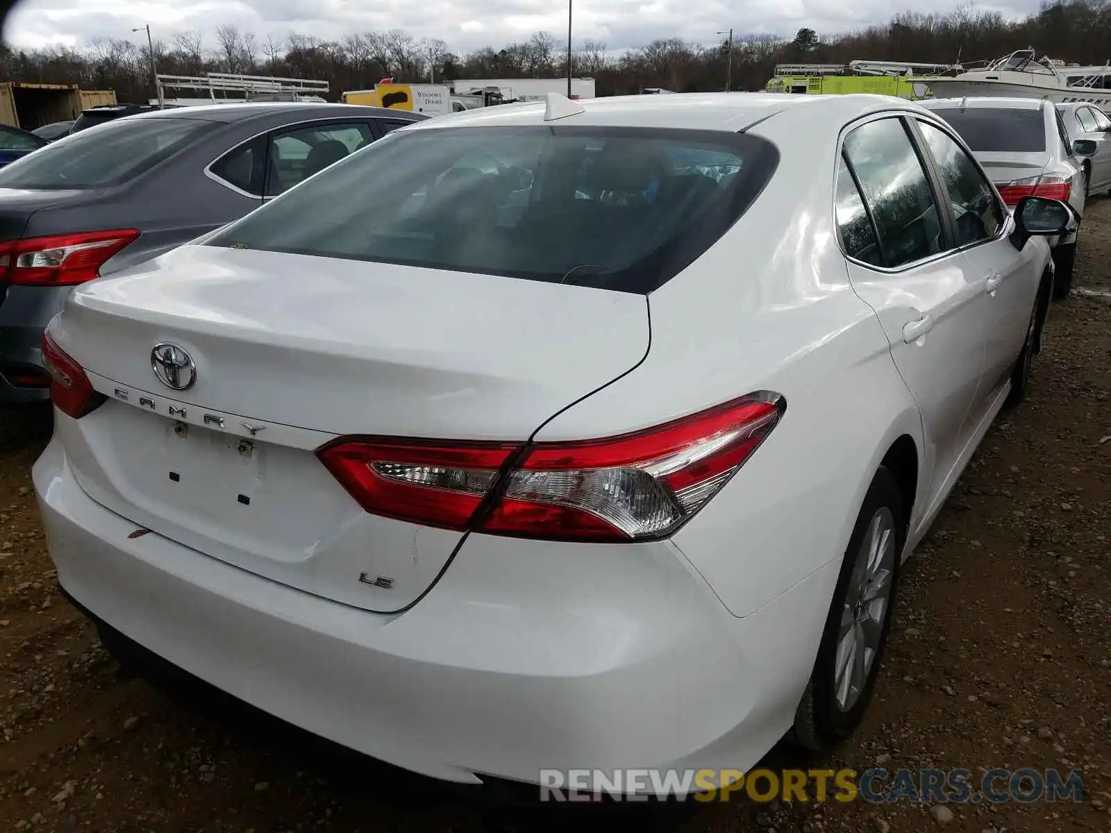 4 Photograph of a damaged car 4T1B11HK7KU243152 TOYOTA CAMRY 2019