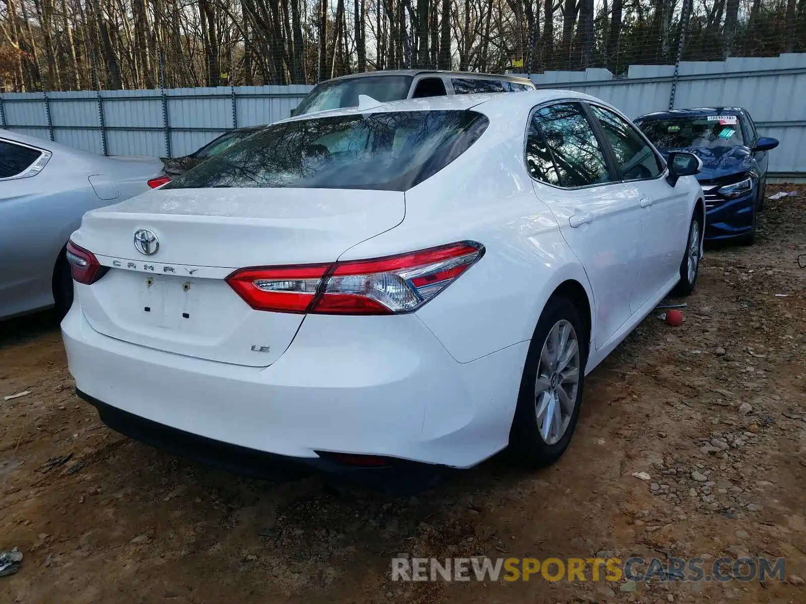 4 Photograph of a damaged car 4T1B11HK7KU243958 TOYOTA CAMRY 2019