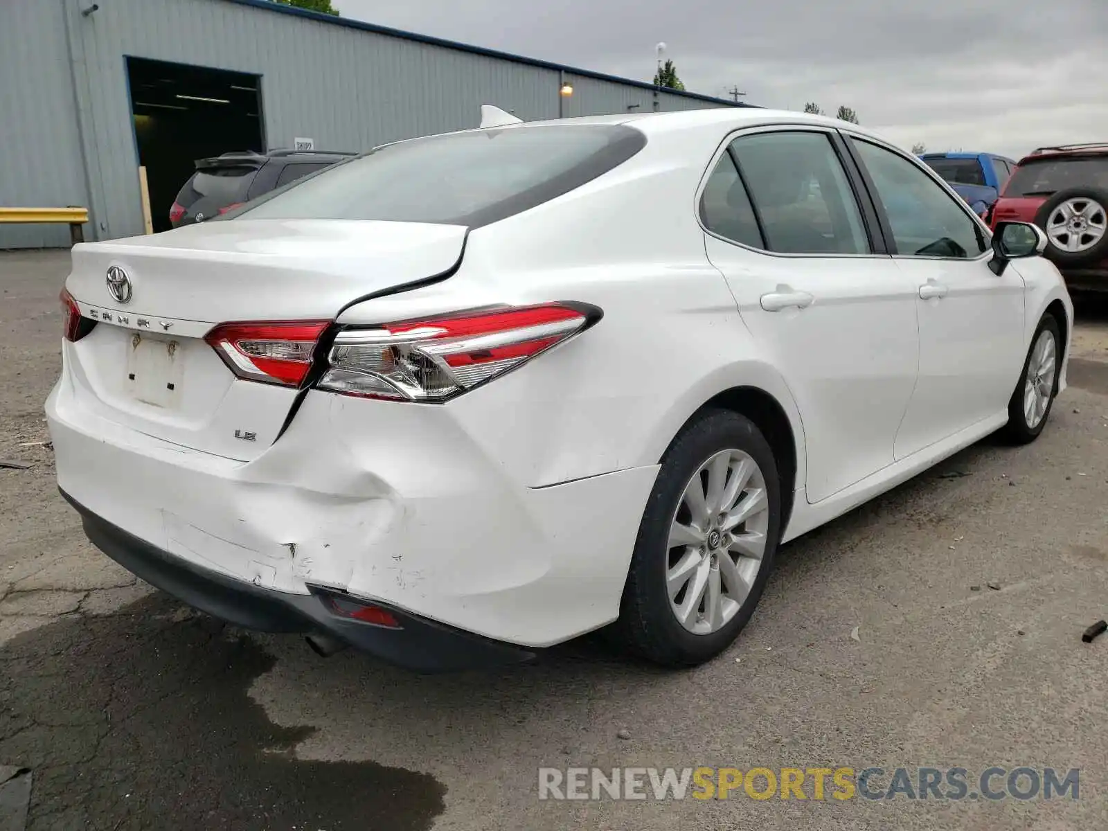 4 Photograph of a damaged car 4T1B11HK7KU243961 TOYOTA CAMRY 2019